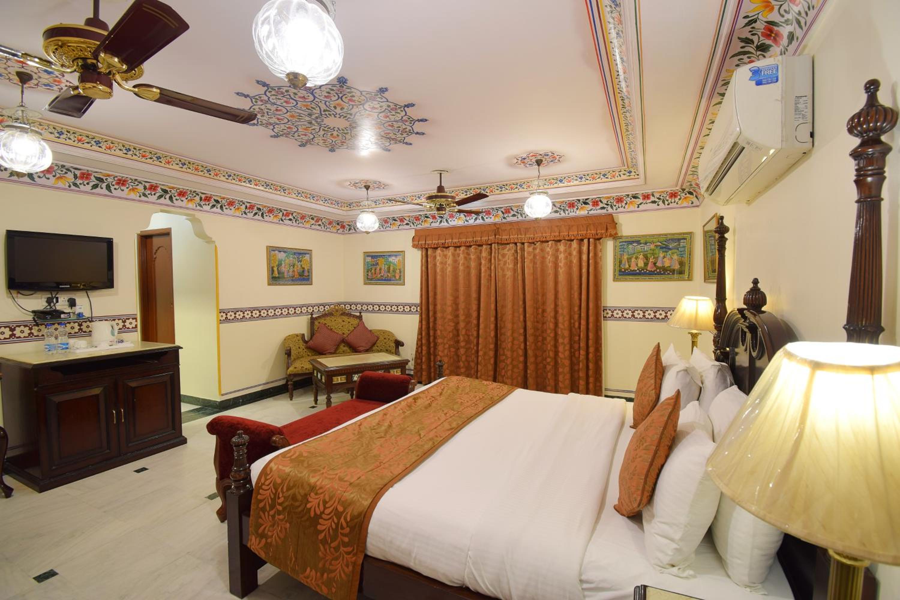 Royal Deluxe Double Room with Car and Chauffeur, Free pickup on arrival from train or bus station, daily Rajasthani dance & music show from 7–9 PM, swimming pool, and a dedicated travel desk to assist with local sightseeing tours and activities - Photo 10