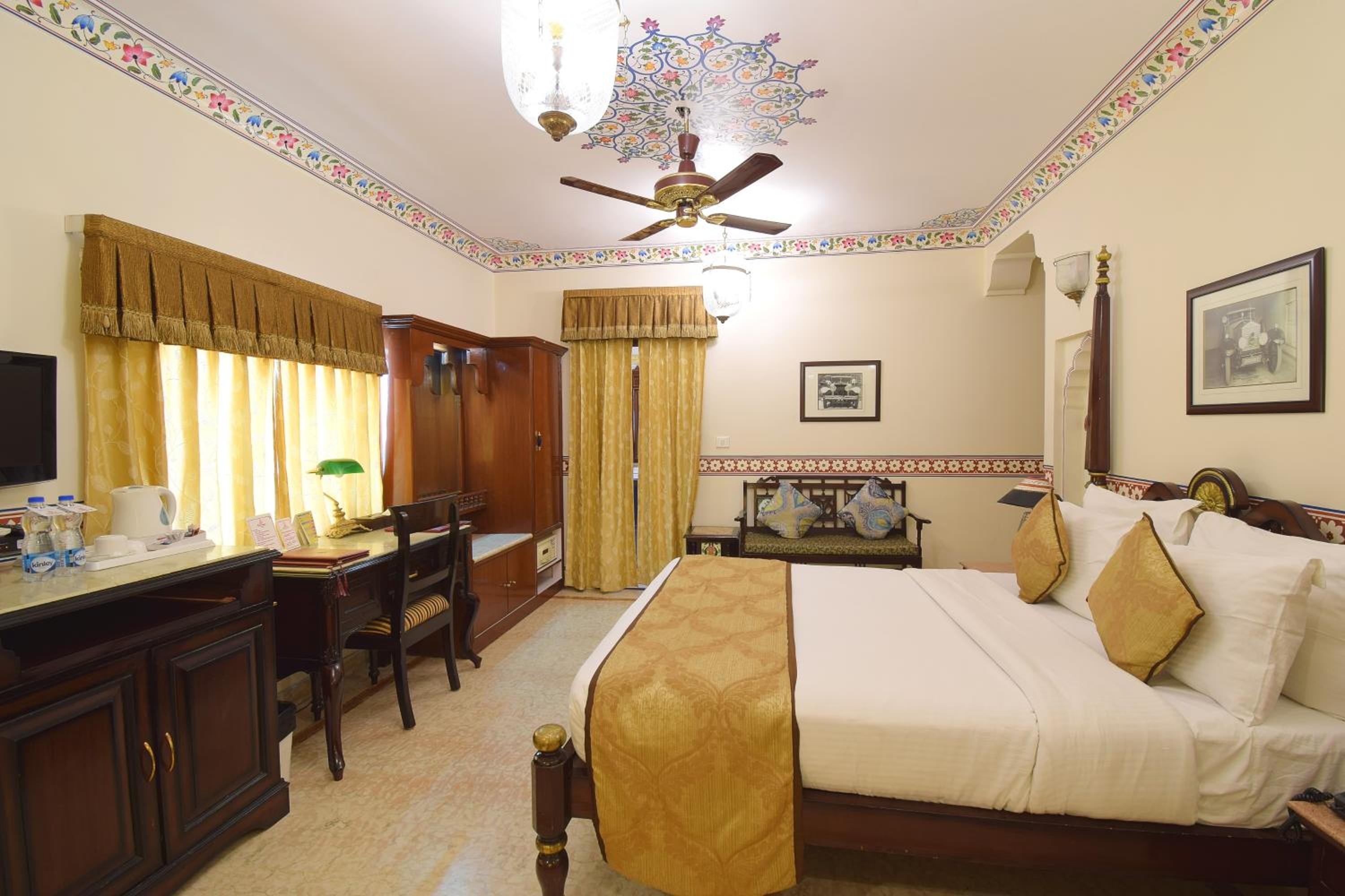 Royal Deluxe Double Room with Car and Chauffeur, Free pickup on arrival from train or bus station, daily Rajasthani dance & music show from 7–9 PM, swimming pool, and a dedicated travel desk to assist with local sightseeing tours and activities - Photo 13