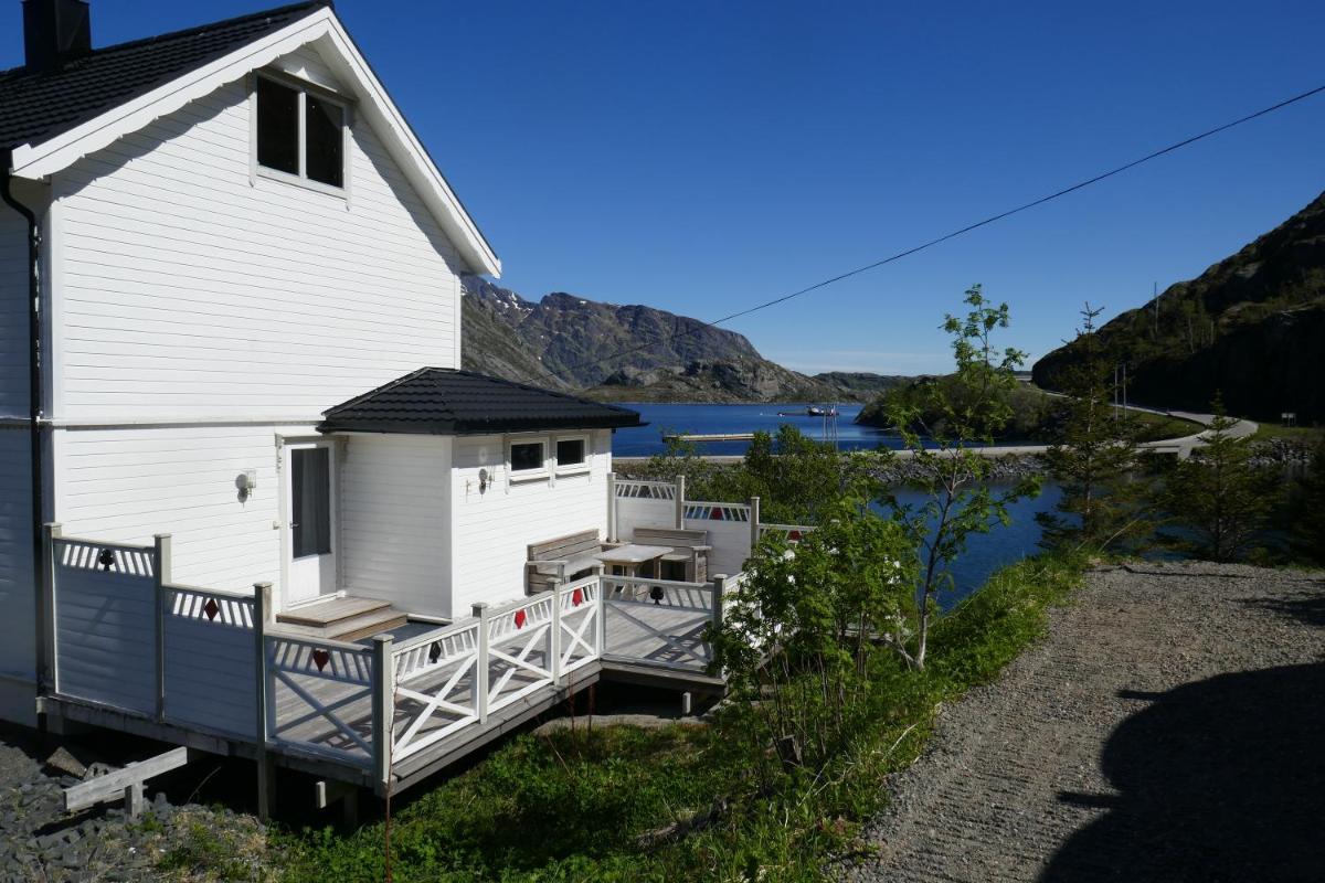 Three-Bedroom House - Photo 32
