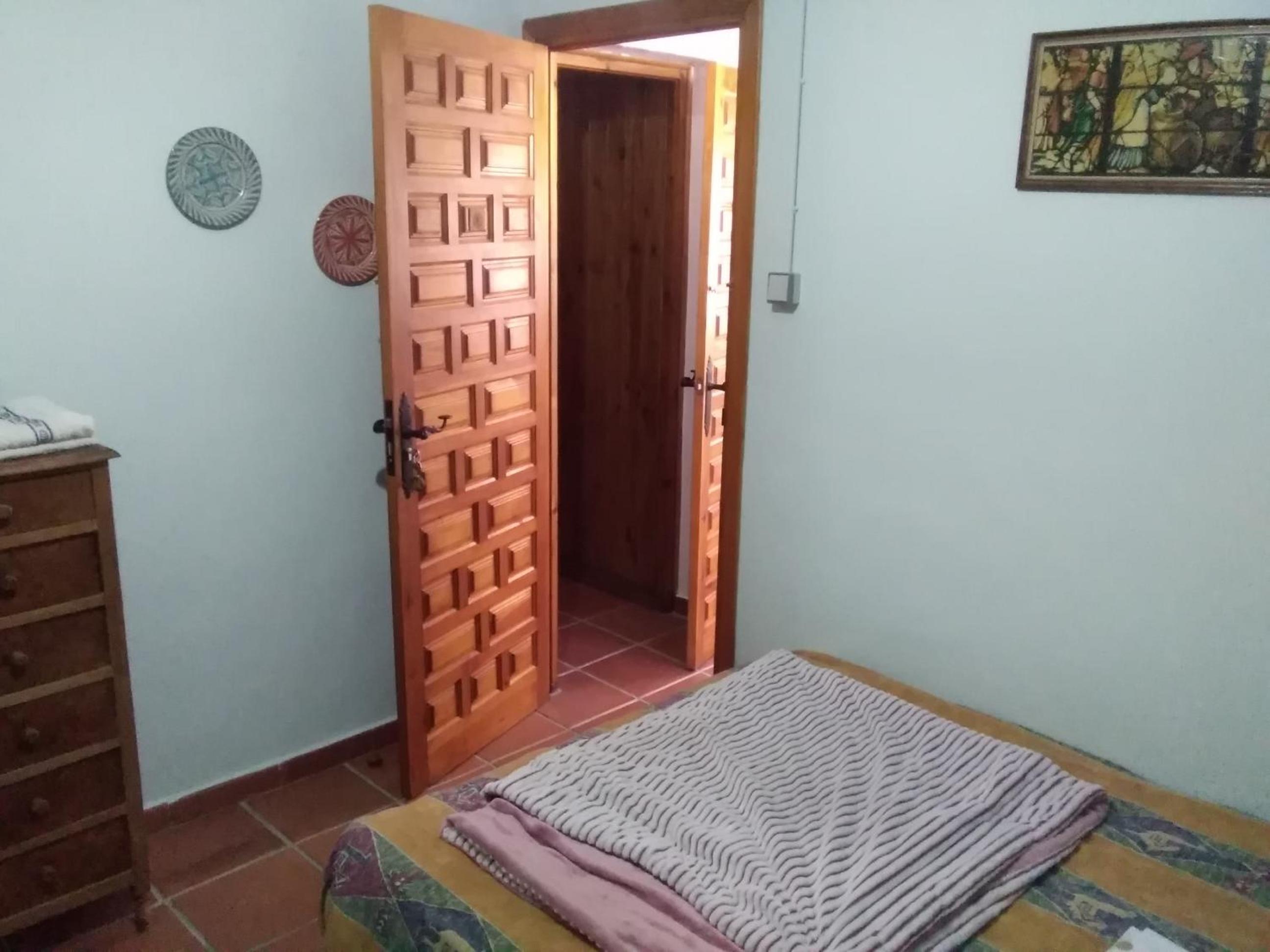 Habitación Queen con Baño Compartido