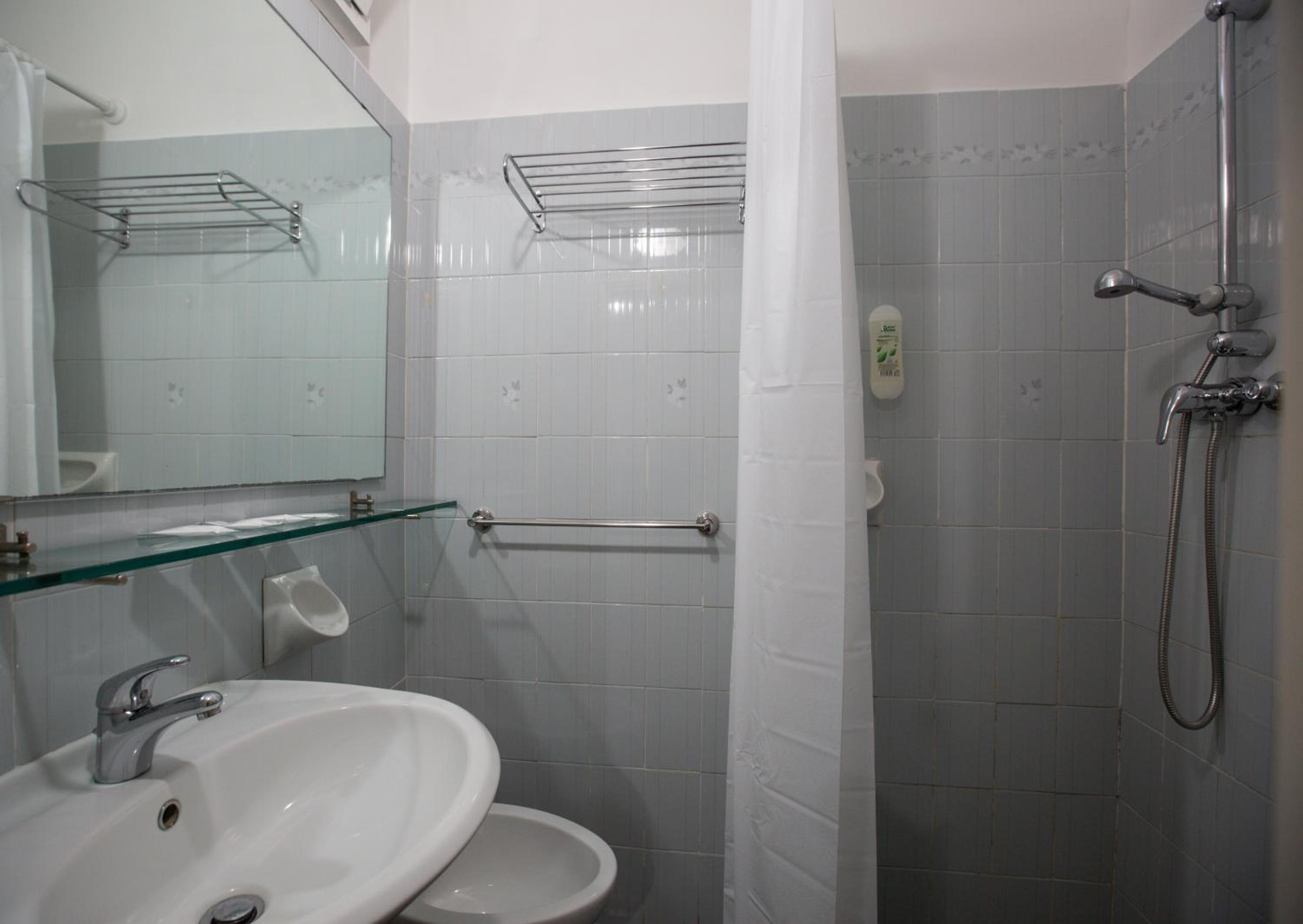 Quadruple Room with Balcony photo 3