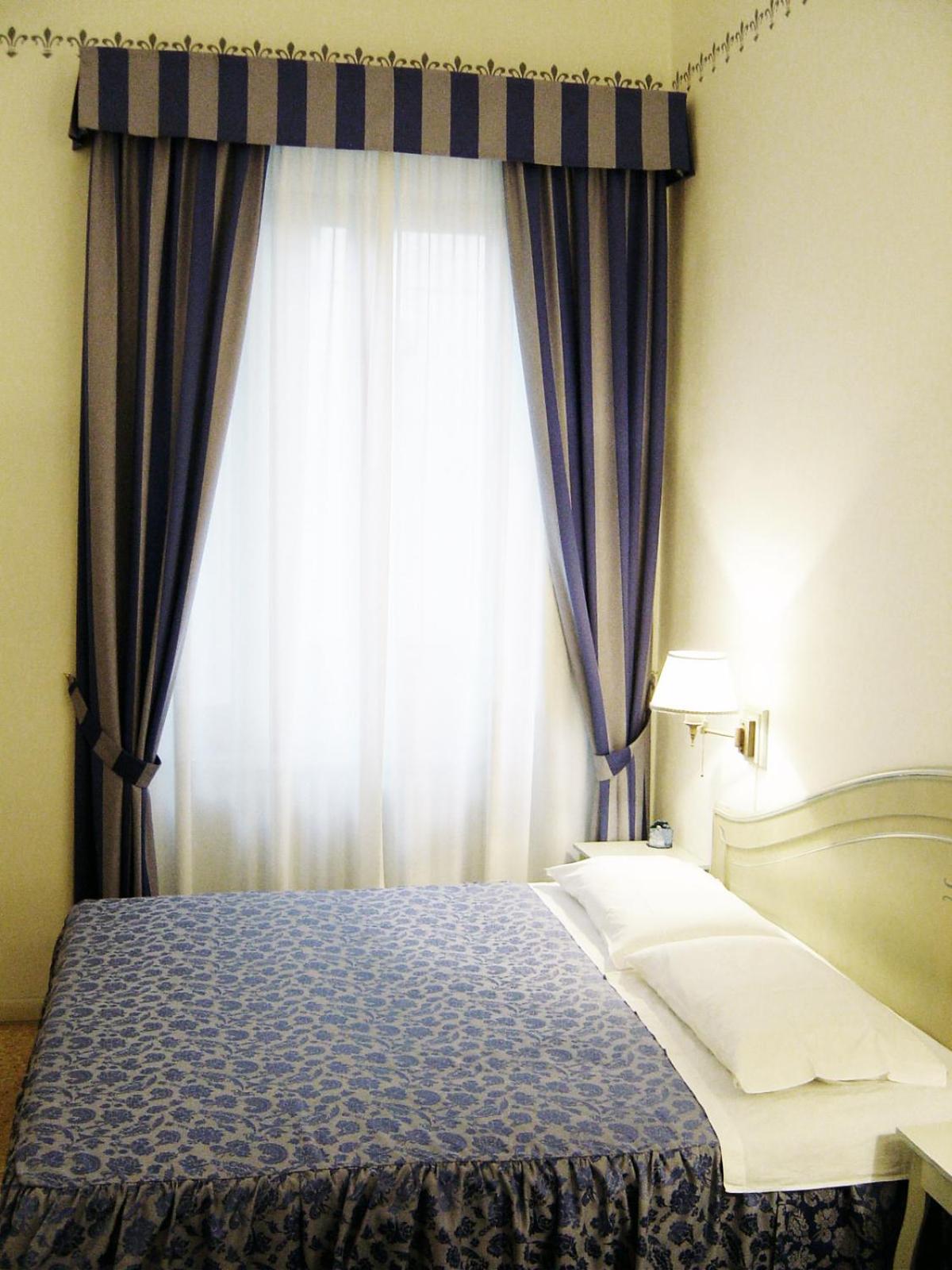 Triple Room - Photo 1