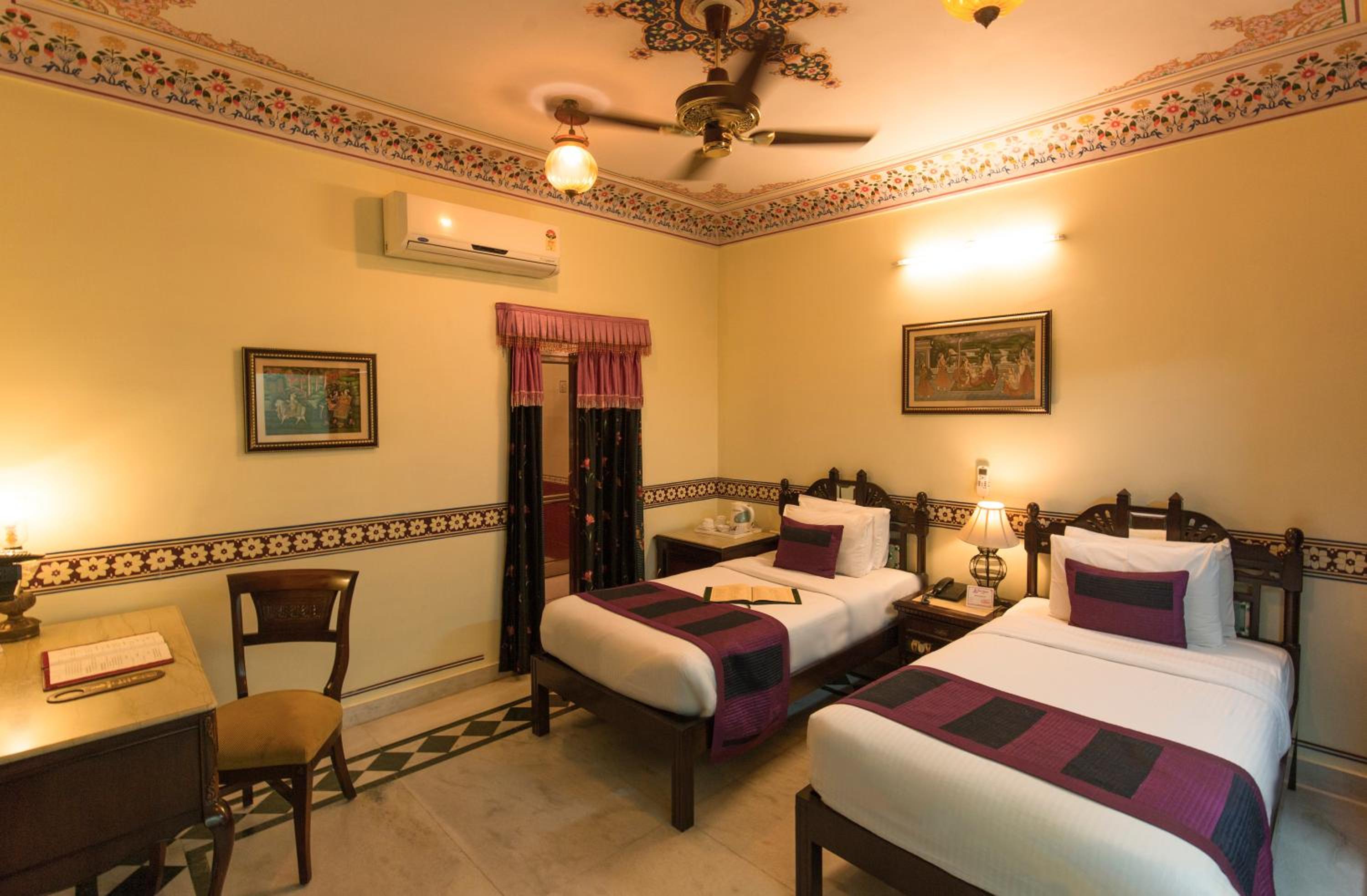 Royal Deluxe Double Room with Car and Chauffeur, Free pickup on arrival from train or bus station, daily Rajasthani dance & music show from 7–9 PM, swimming pool, and a dedicated travel desk to assist with local sightseeing tours and activities - Photo 21