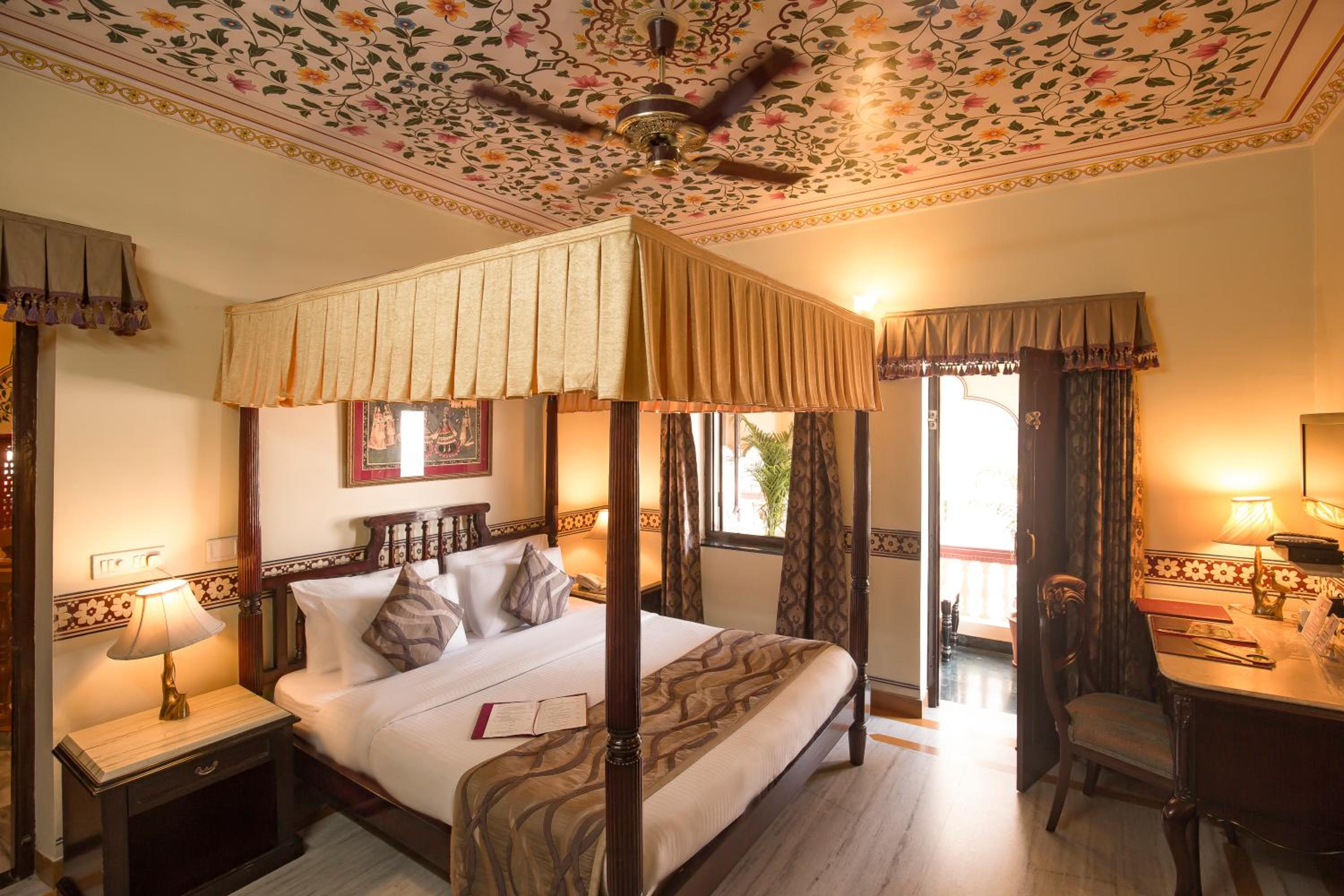 Royal Deluxe Double Room with Car and Chauffeur, Free pickup on arrival from train or bus station, daily Rajasthani dance & music show from 7–9 PM, swimming pool, and a dedicated travel desk to assist with local sightseeing tours and activities - Photo 1