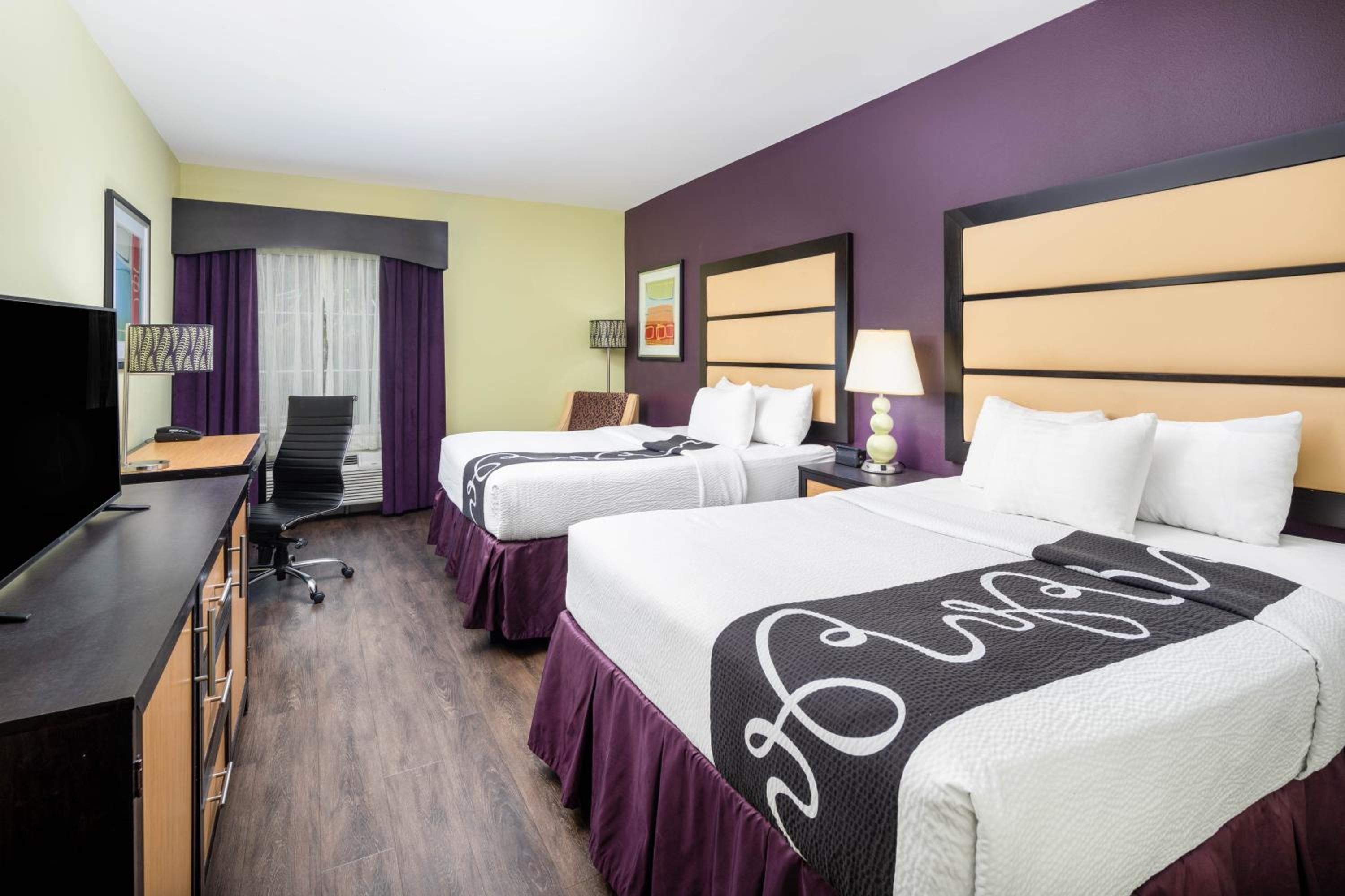 Deluxe Queen Room with Two Queen Beds - Photo 1