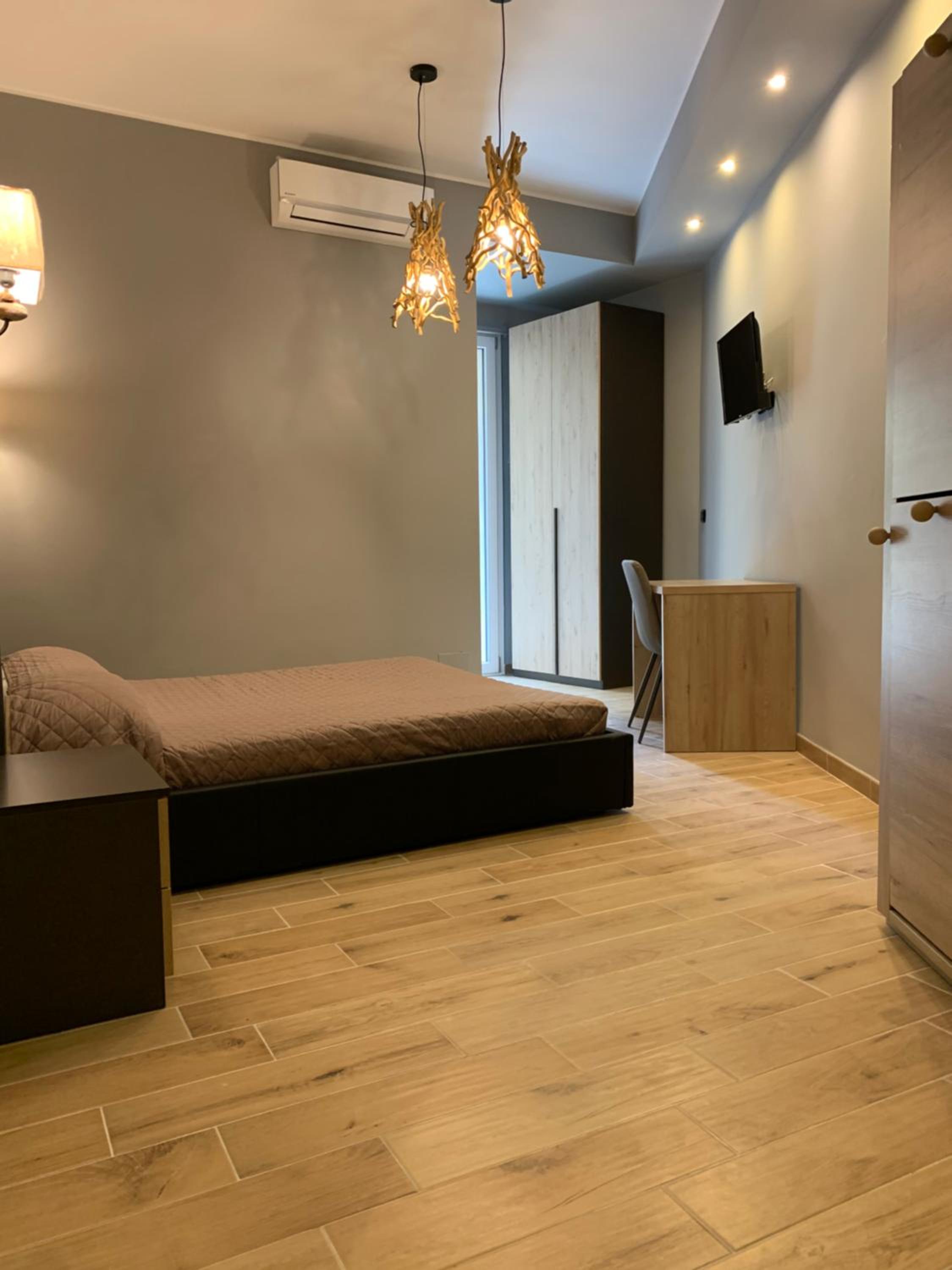 Quadruple Room with Private Bathroom - Photo 1