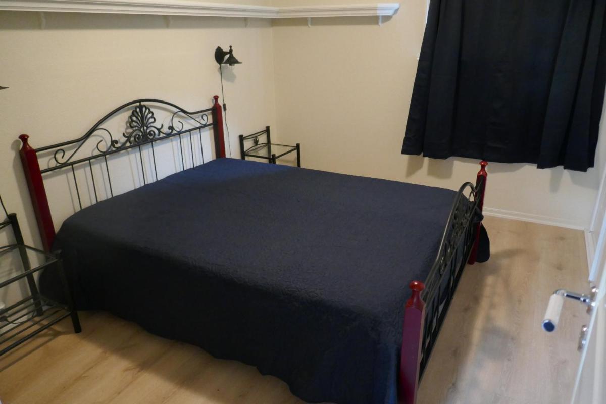 Three-Bedroom House - Photo 24