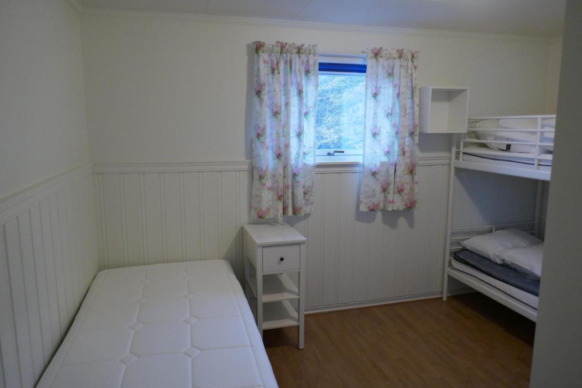 Three-Bedroom House - Photo 41