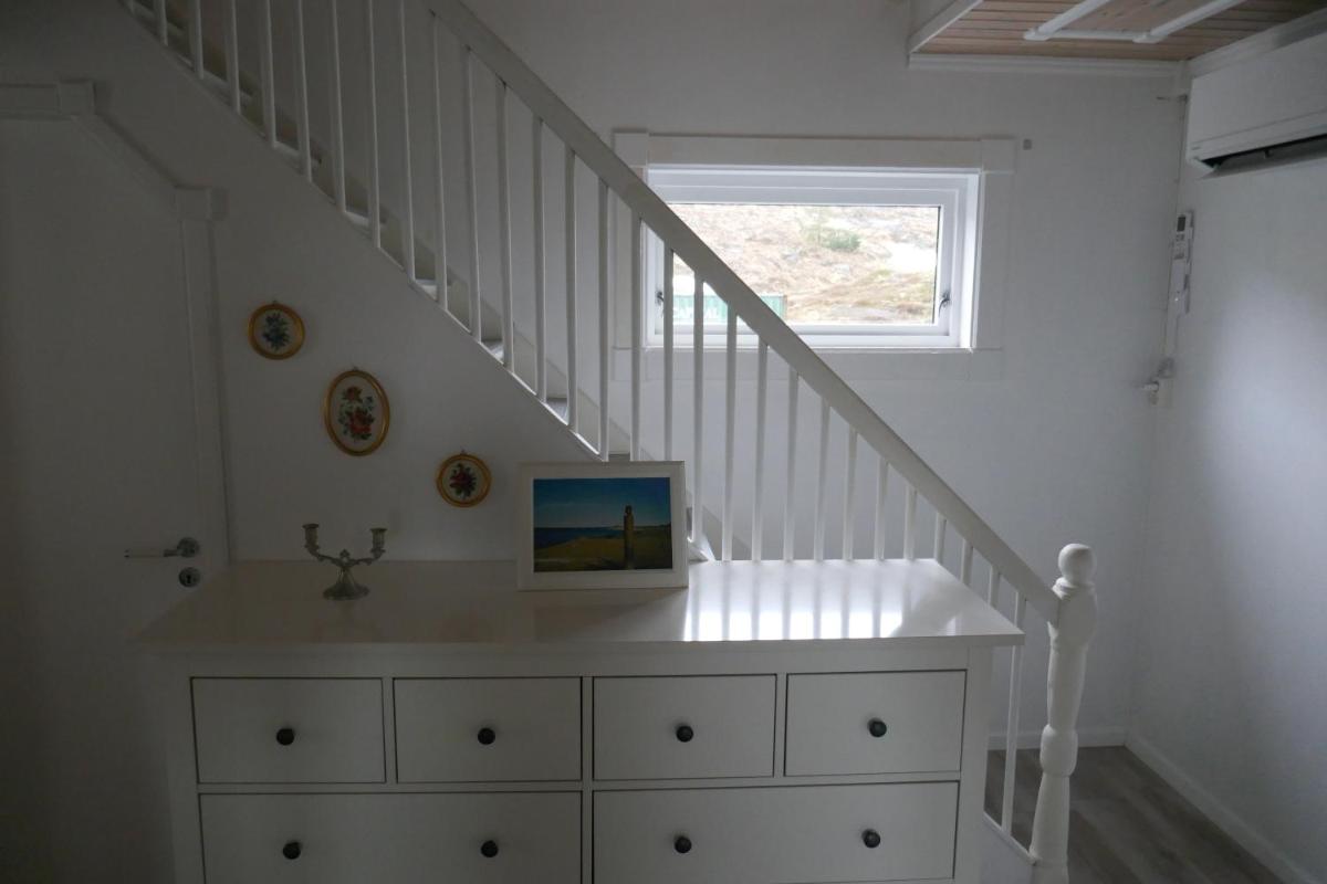 Three-Bedroom House - Photo 40