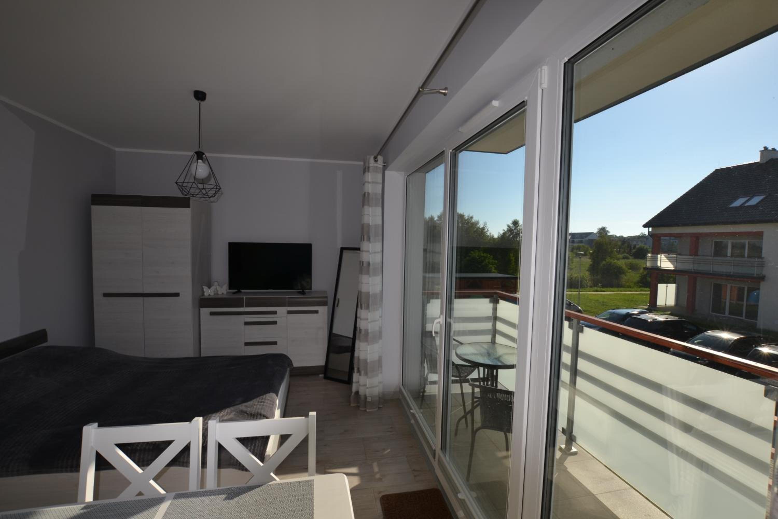 Apartment with Balcony - Photo 10