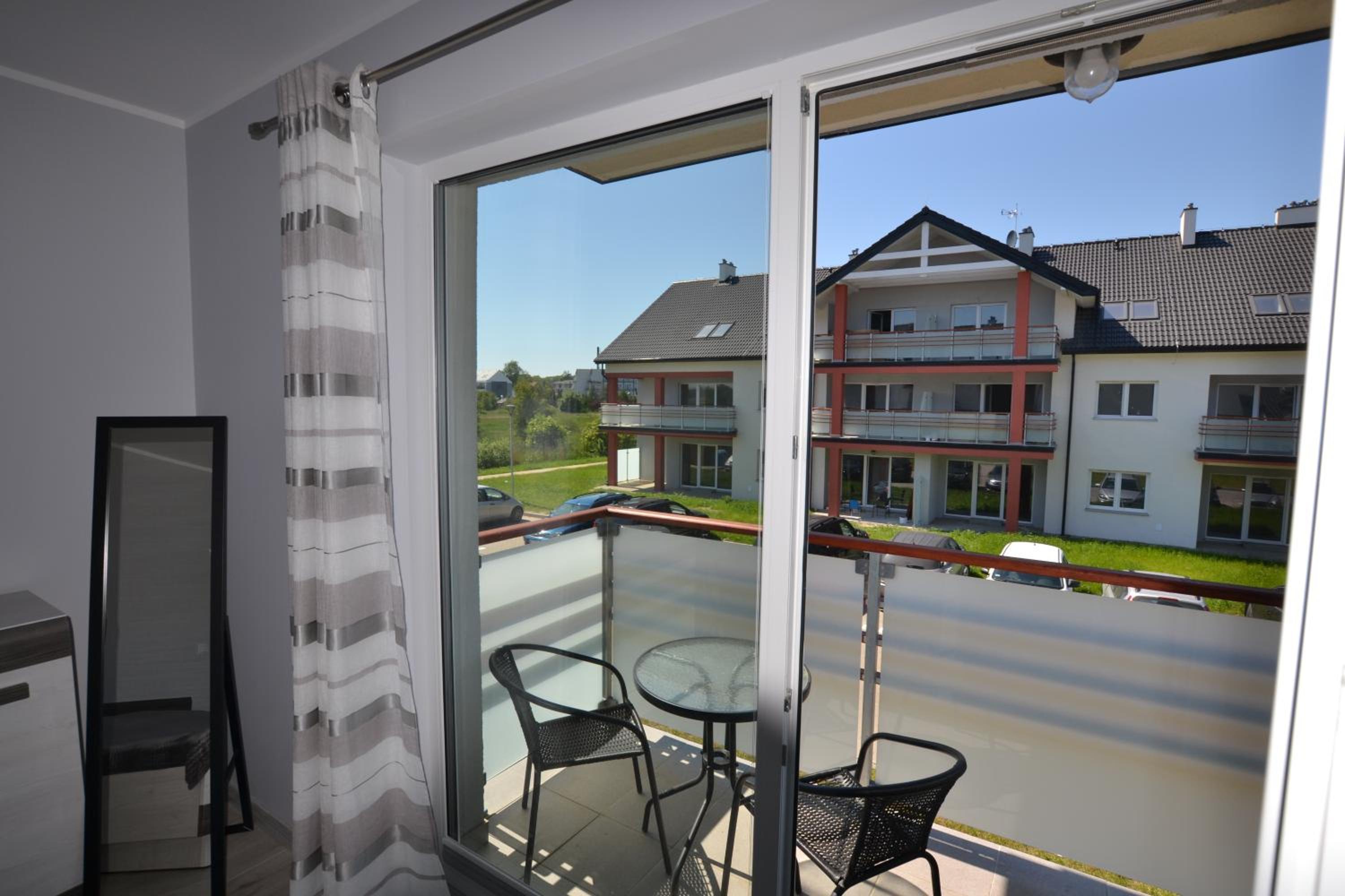 Apartment with Balcony - Photo 16