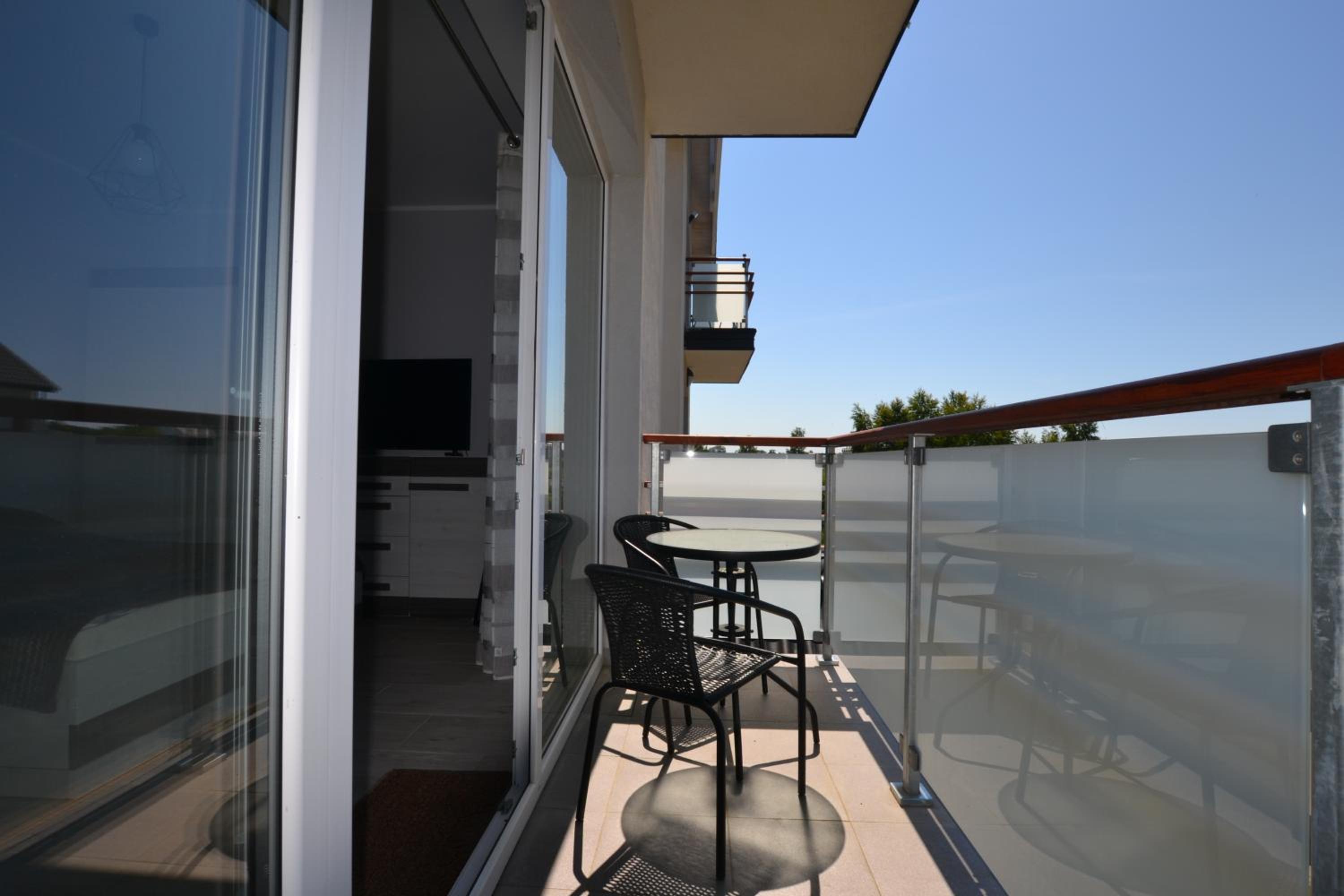Apartment with Balcony - Photo 17