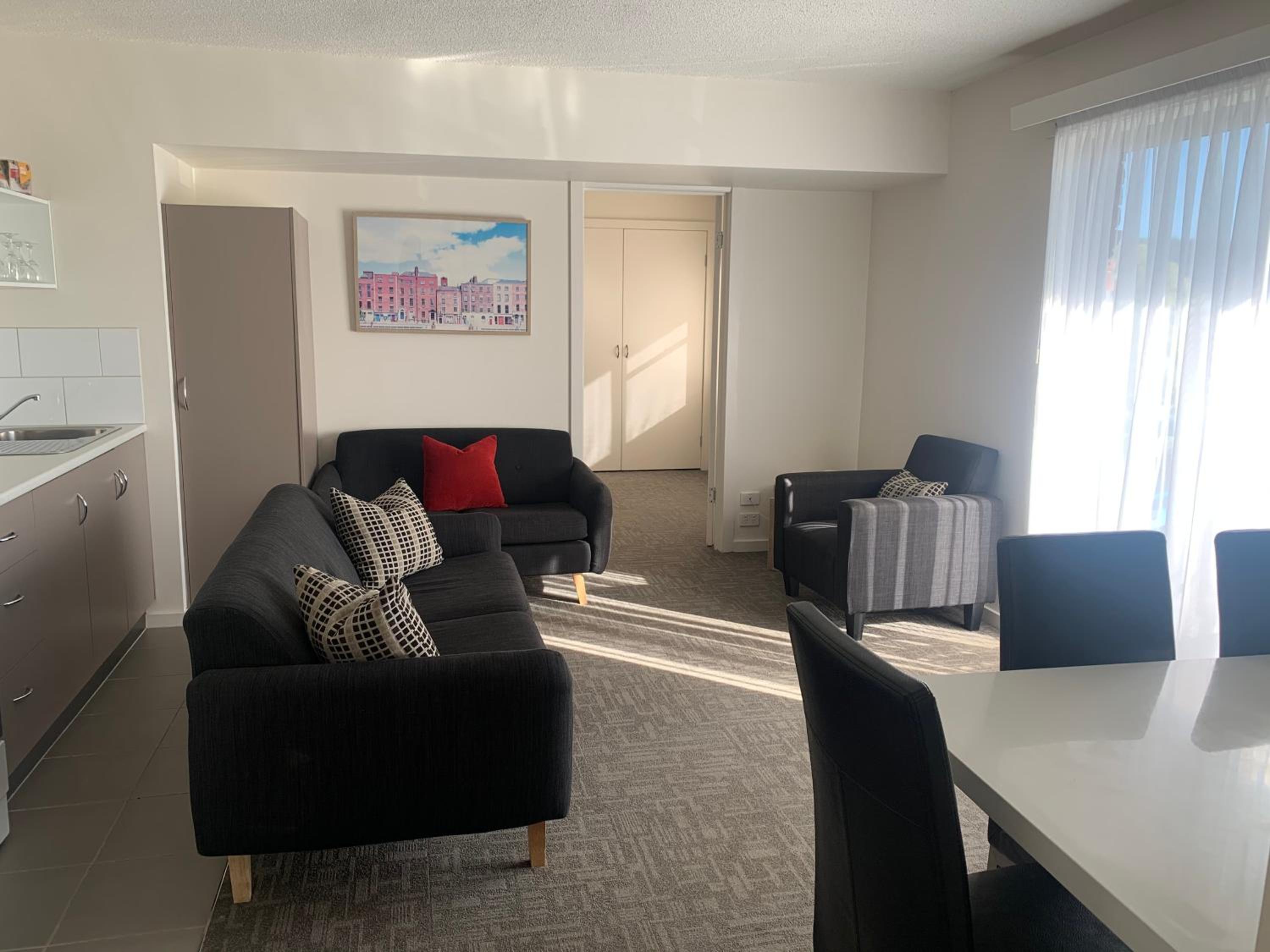 Three-Bedroom Apartment - Photo 12