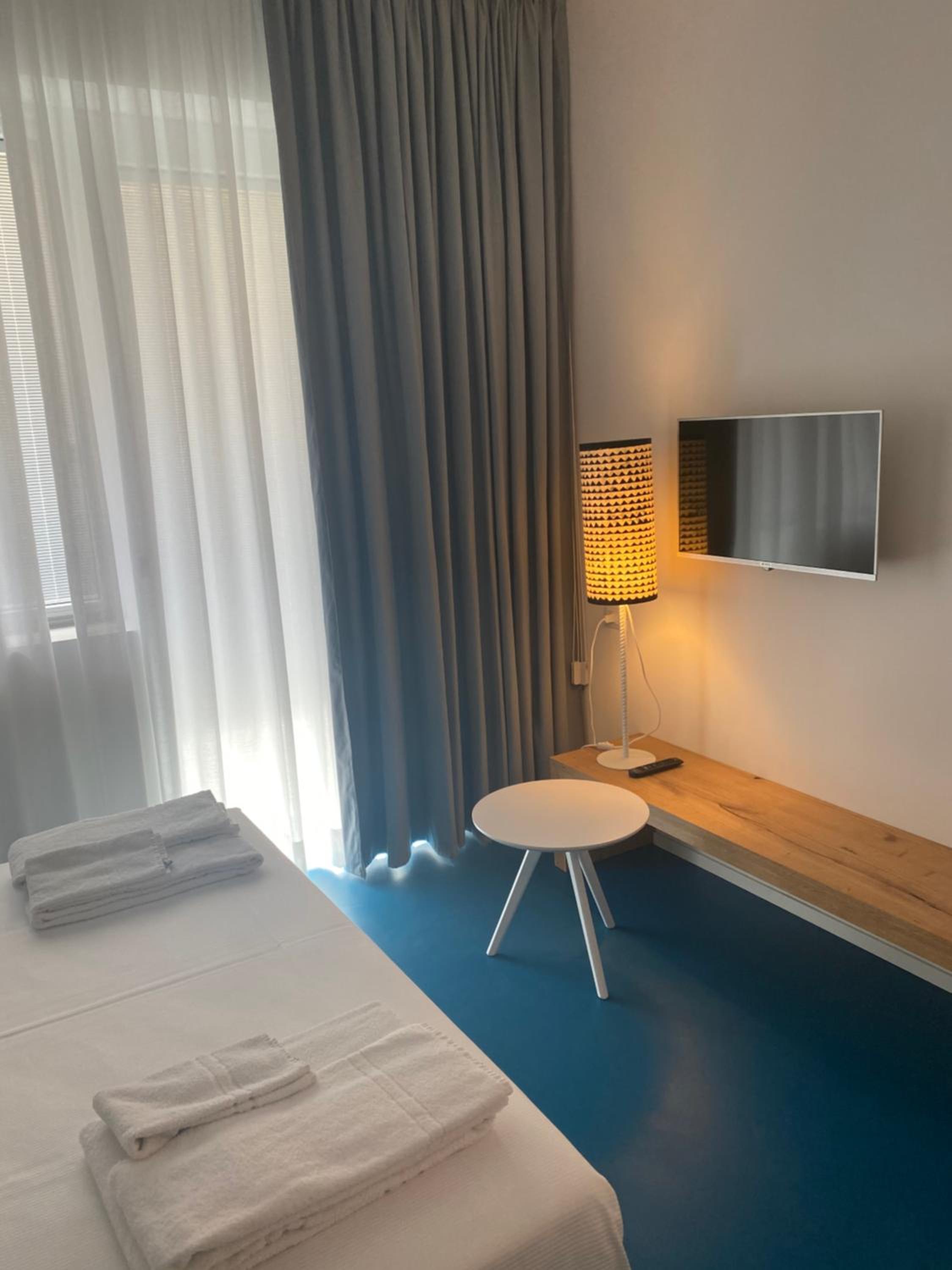 Deluxe Double Room with Balcony - Photo 21
