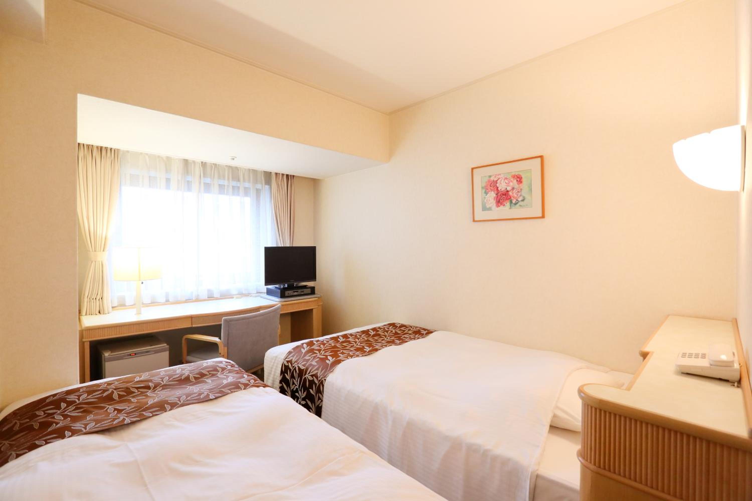 Economy Twin Room - Photo 1
