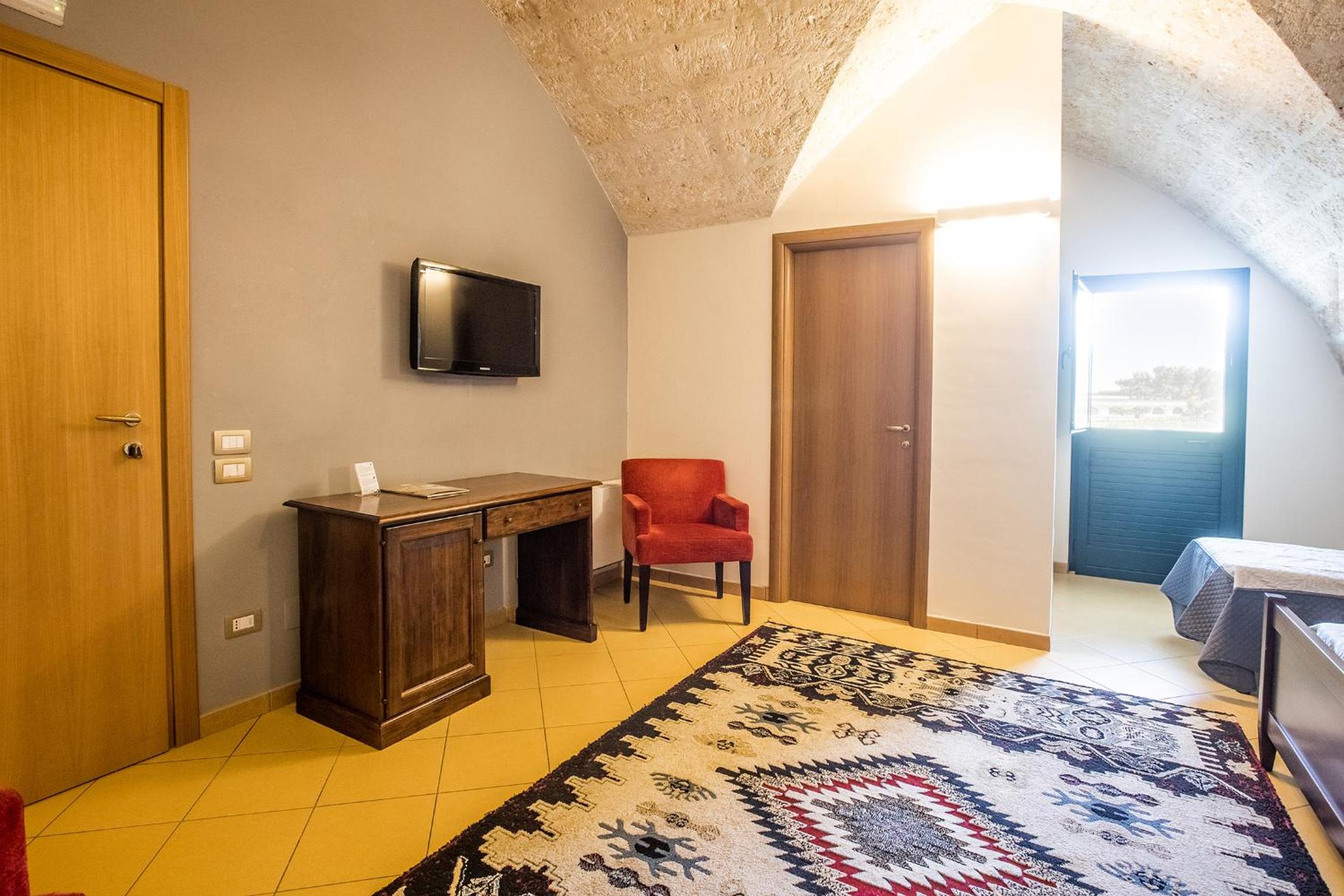 Standard Quadruple Room - Photo 8