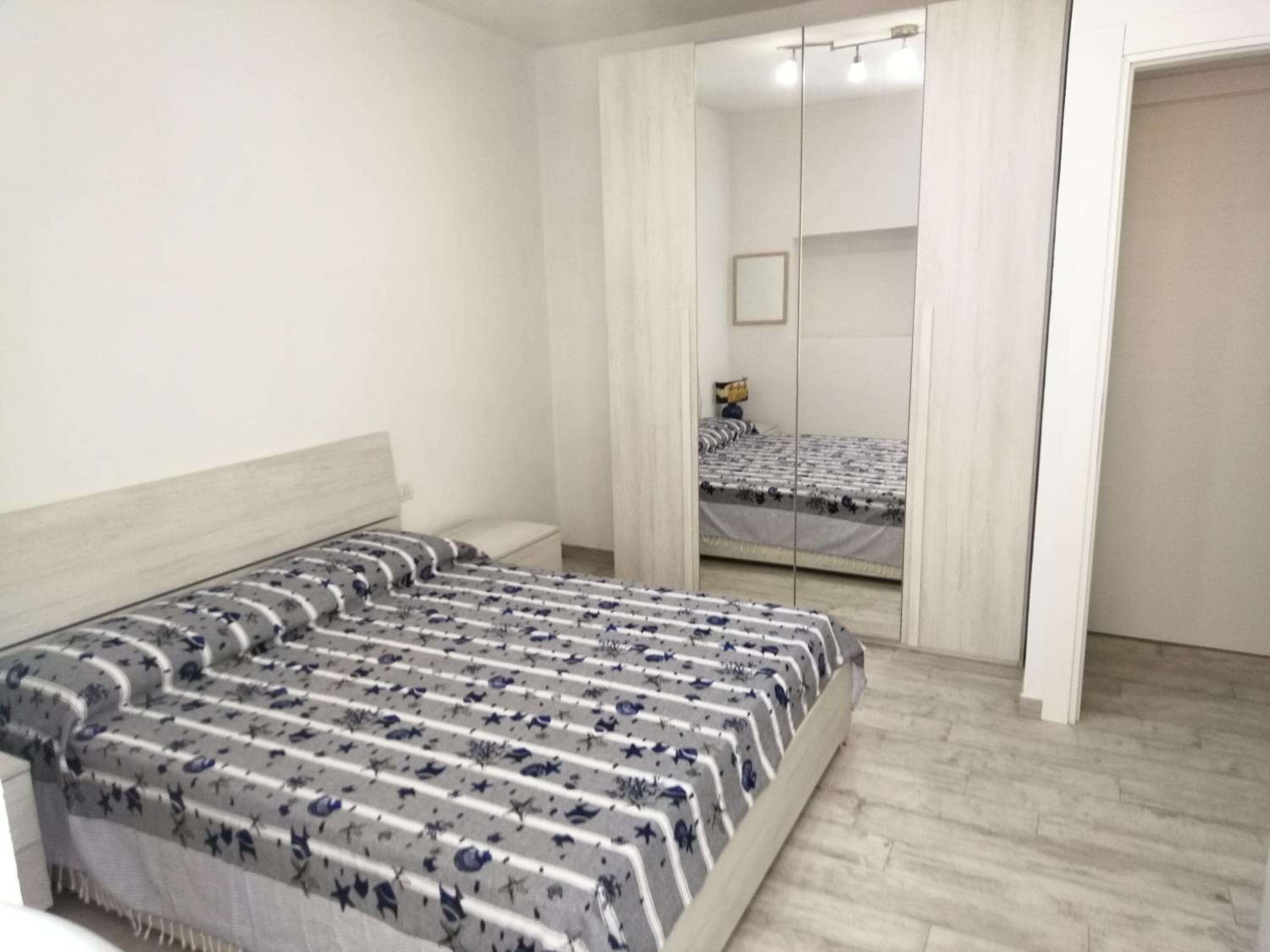 Three-Bedroom Apartment - Photo 8
