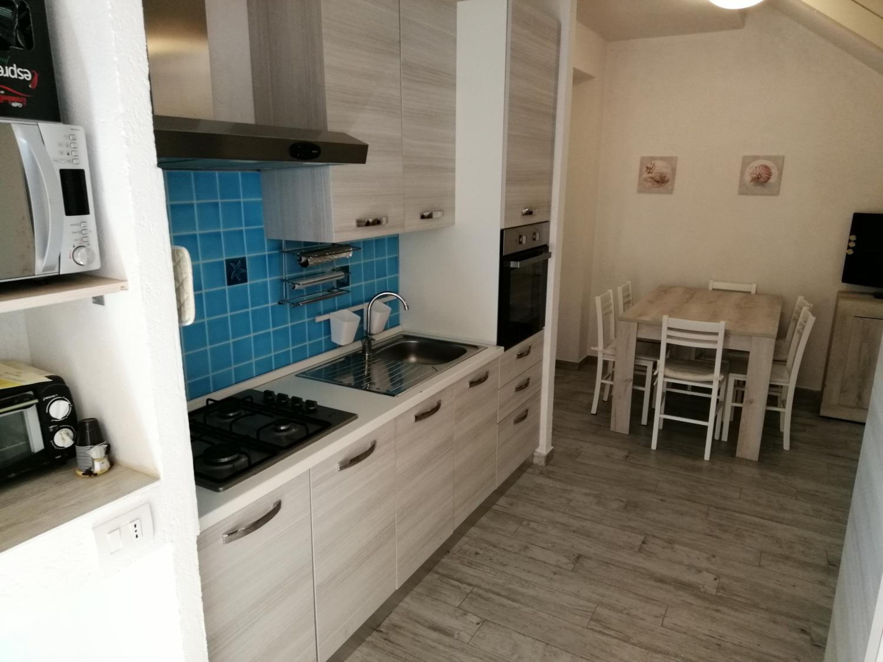 Three-Bedroom Apartment - Photo 2