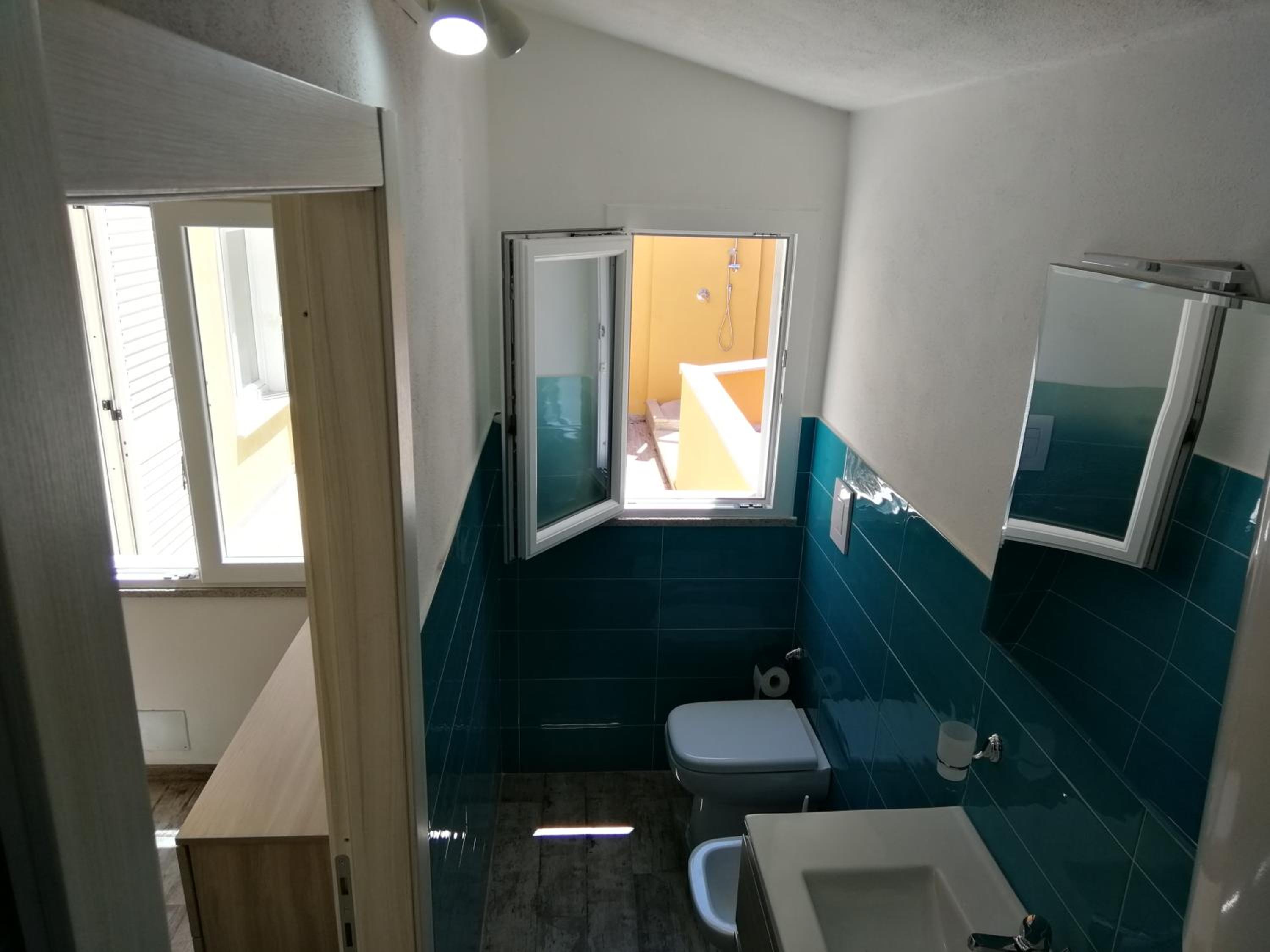 Three-Bedroom Apartment - Photo 19
