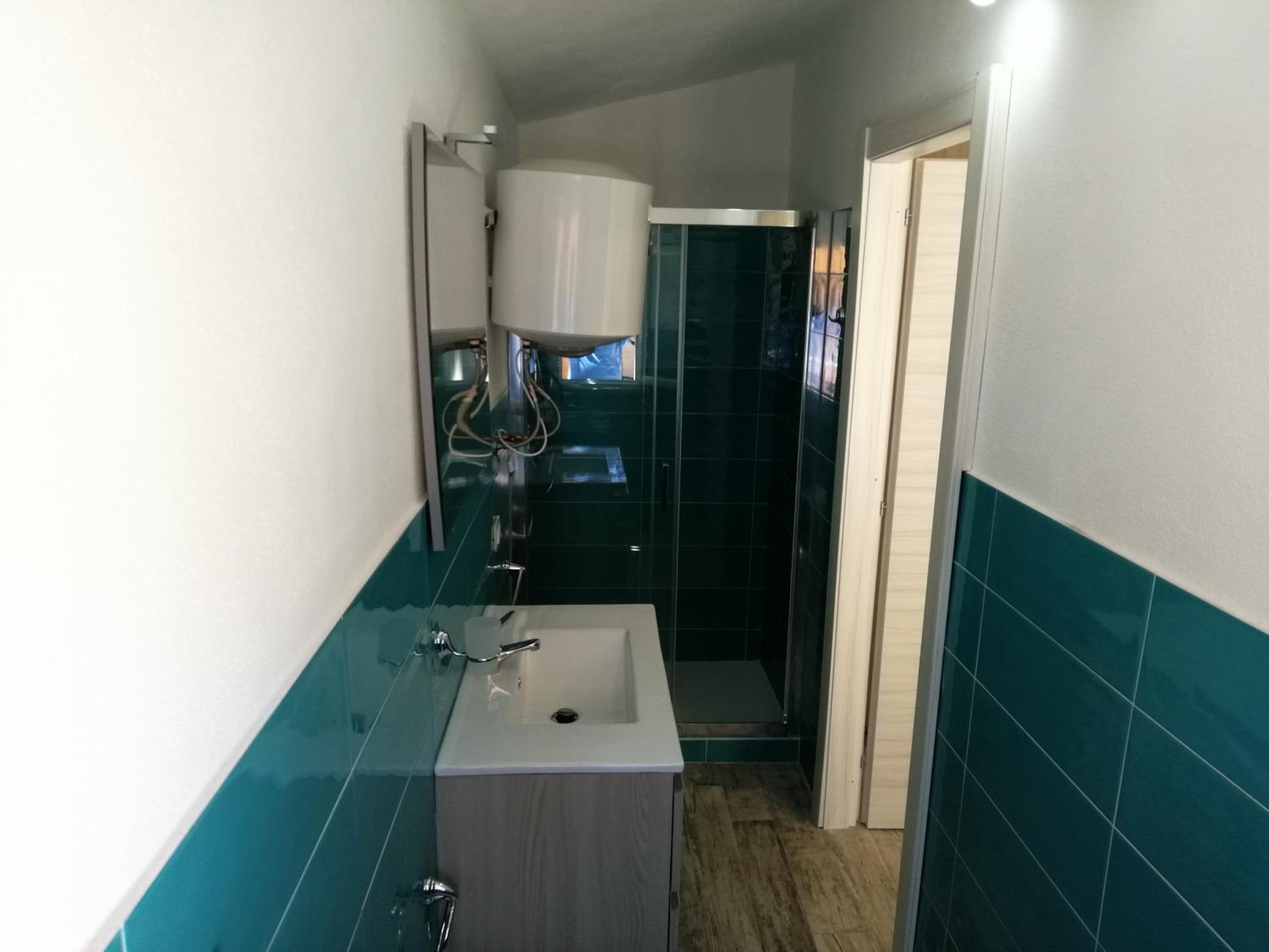 Three-Bedroom Apartment - Photo 20