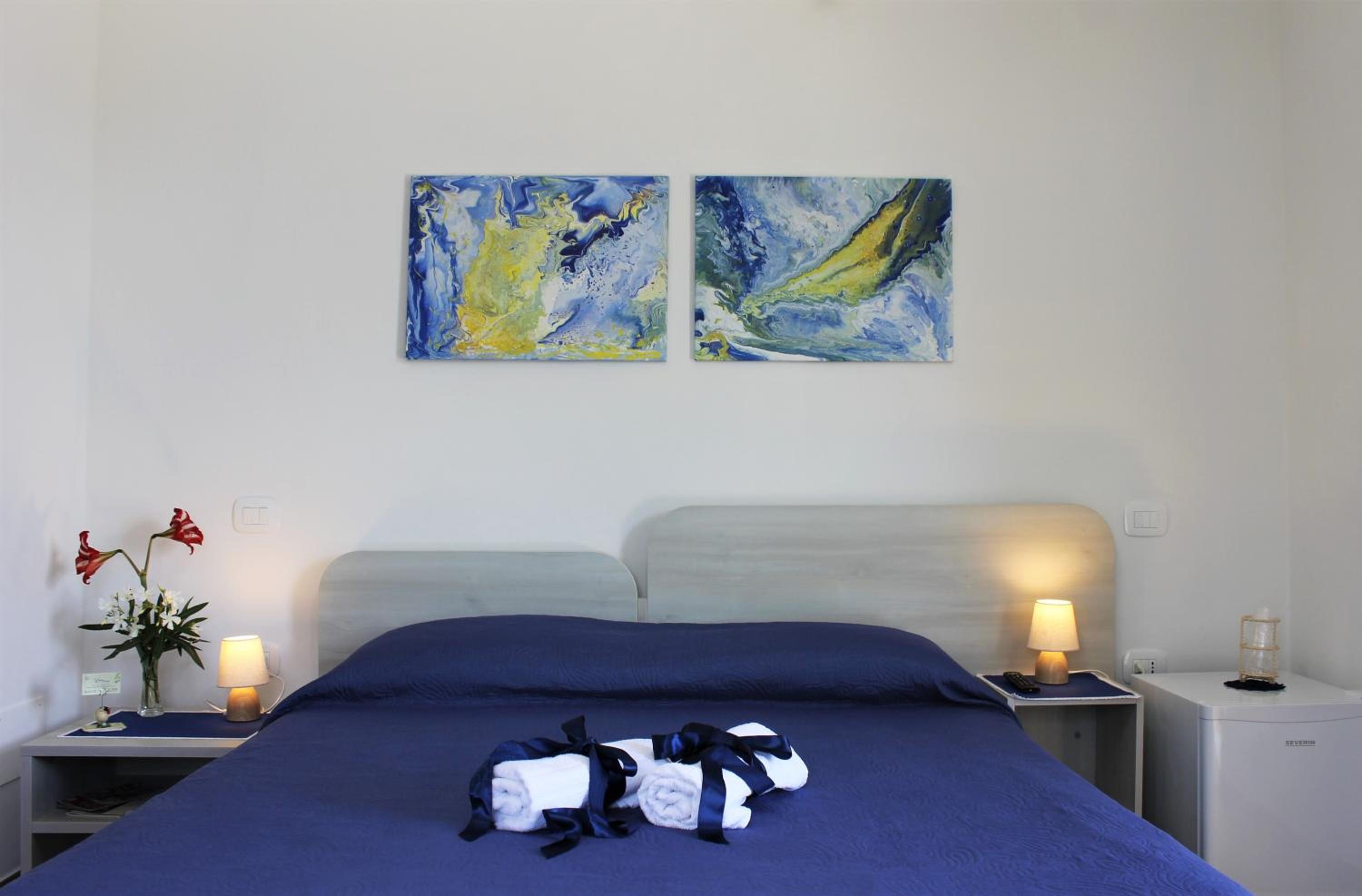Quadruple Room with Private Bathroom - Photo 1