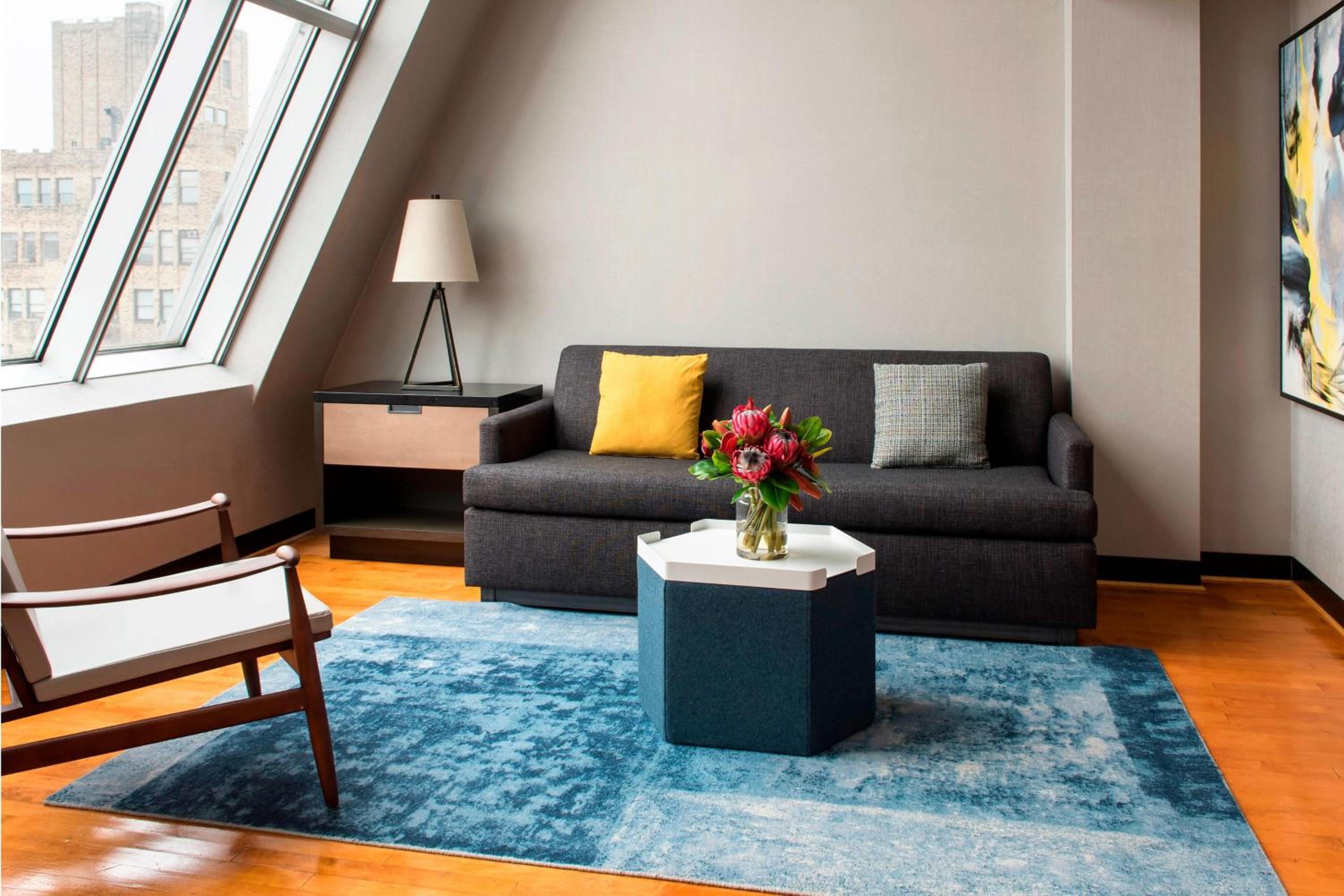 High Floor One-Bedroom Queen Suite with Skyline View, Sofa Bed and Roll-In Shower - Mobility Access