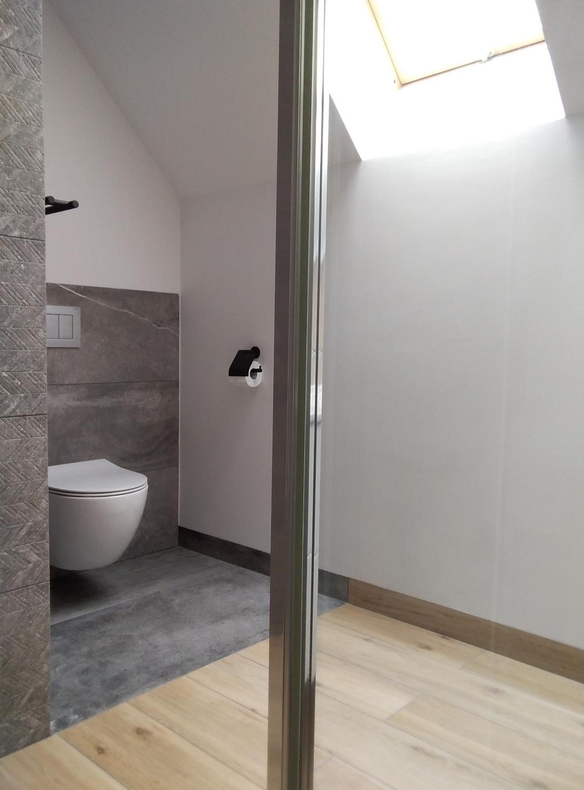 Three-Bedroom Apartment - Photo 44