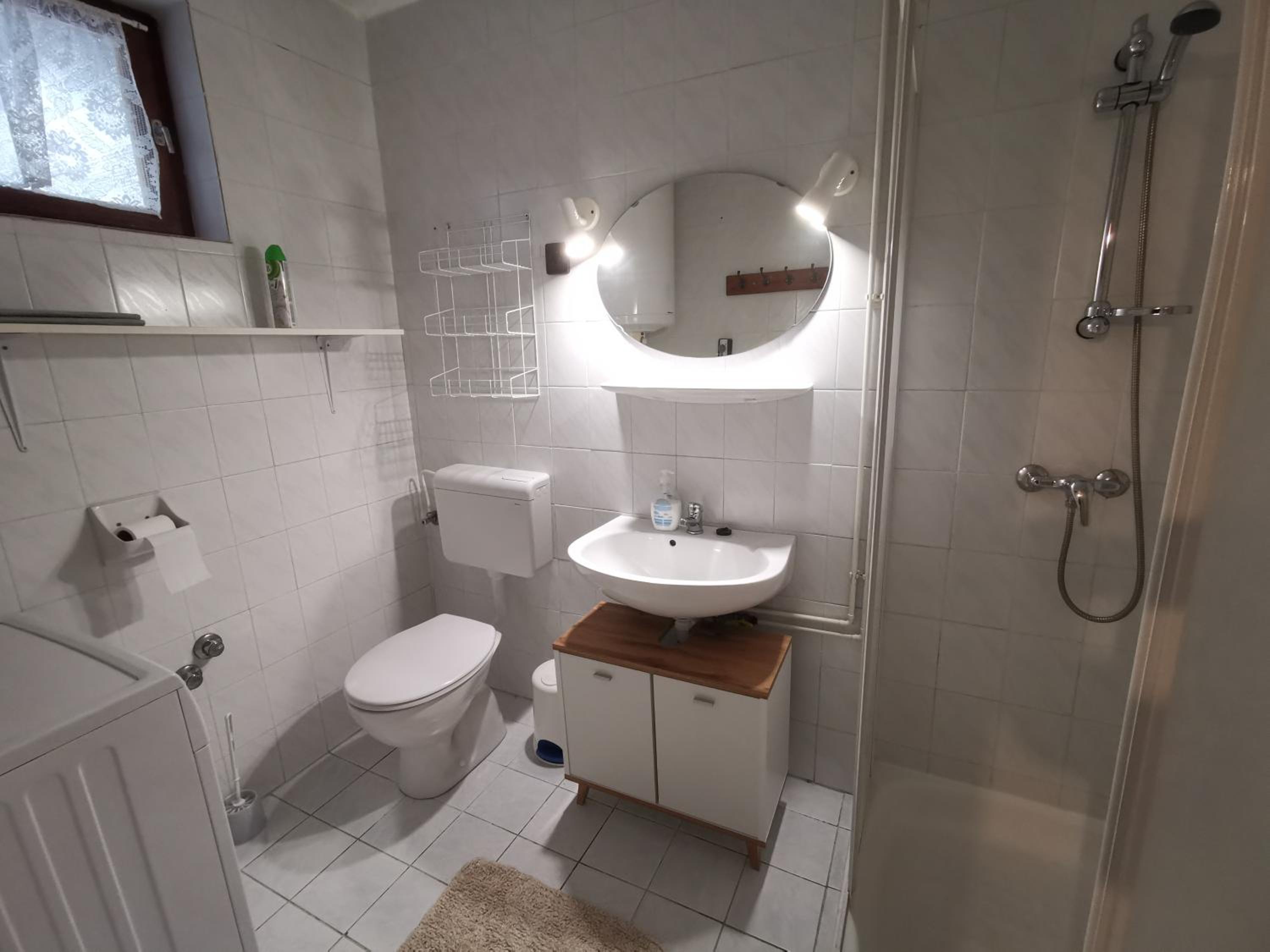 Three-Bedroom House - Photo 21
