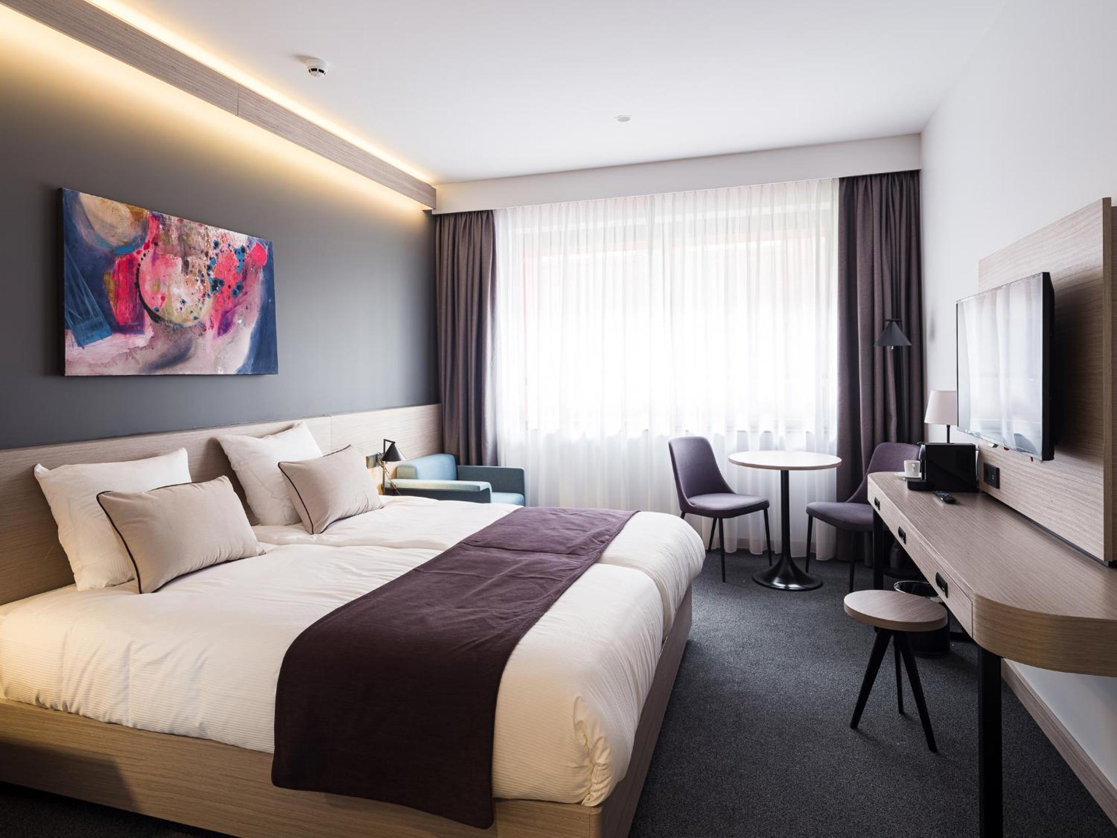 Comfort Twin Room with Kitchenette - Photo 1