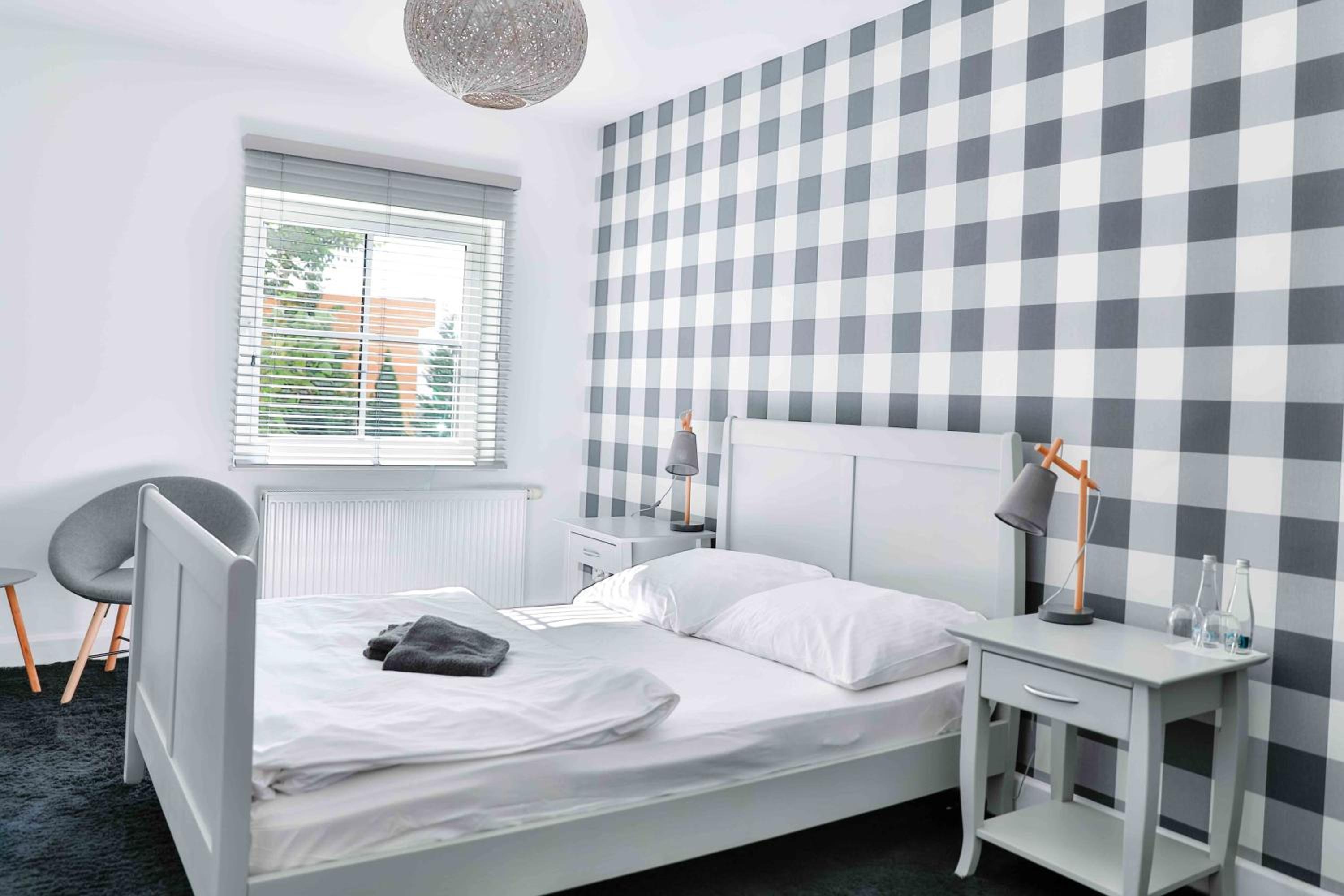 Three-Bedroom Apartment - Photo 1