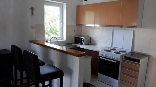 Three-Bedroom Apartment photo 2