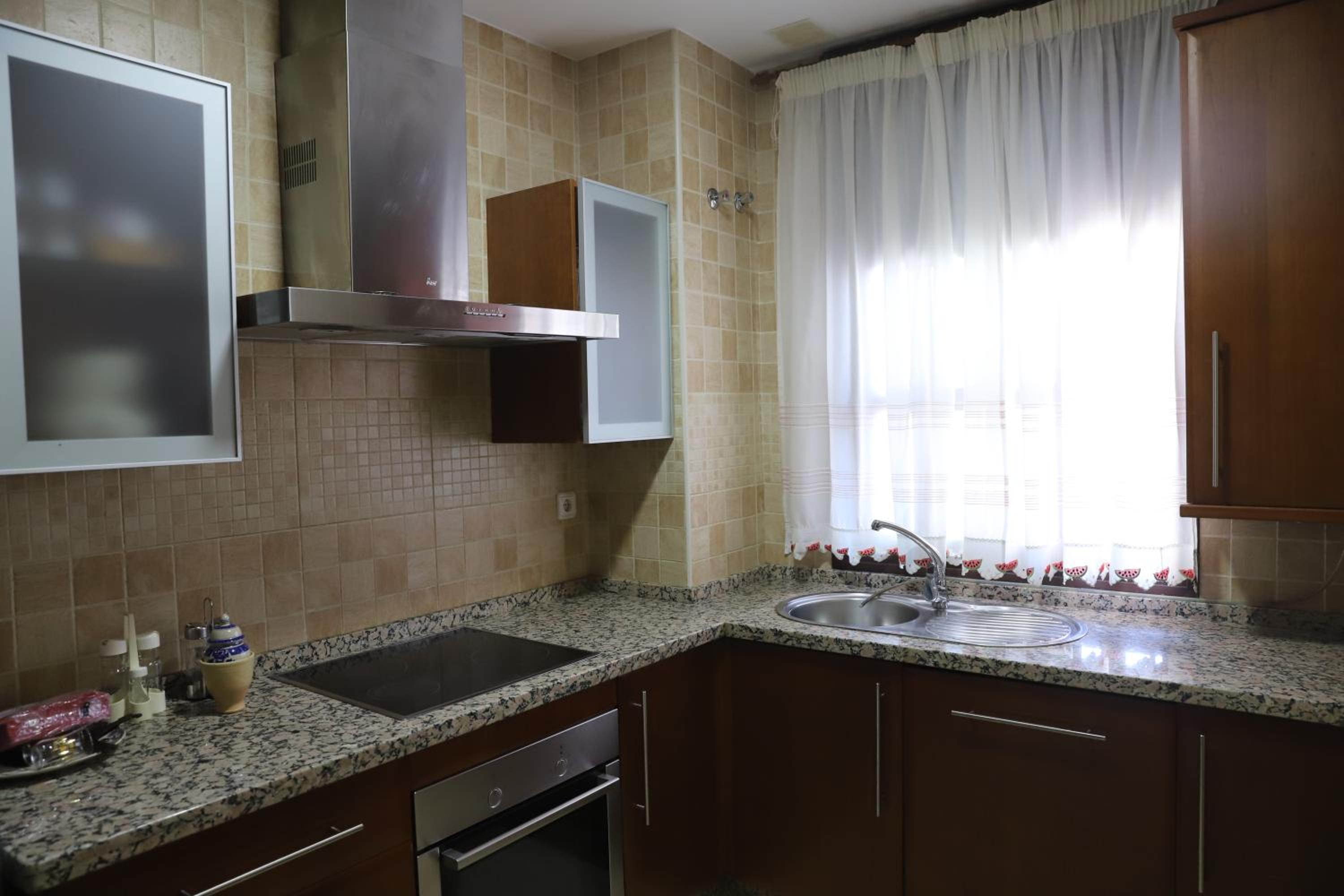 Three-Bedroom Apartment - Photo 52