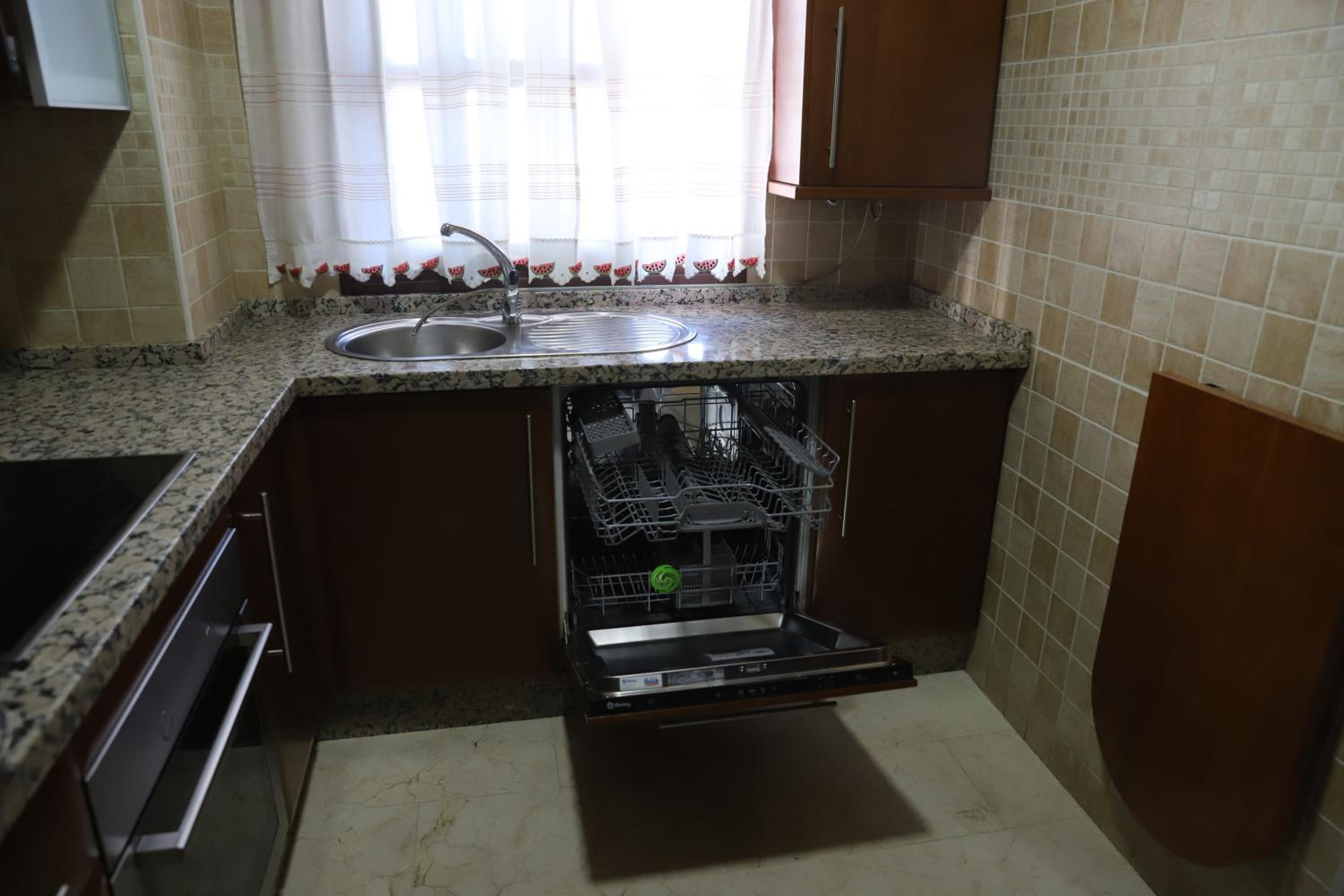 Three-Bedroom Apartment - Photo 42