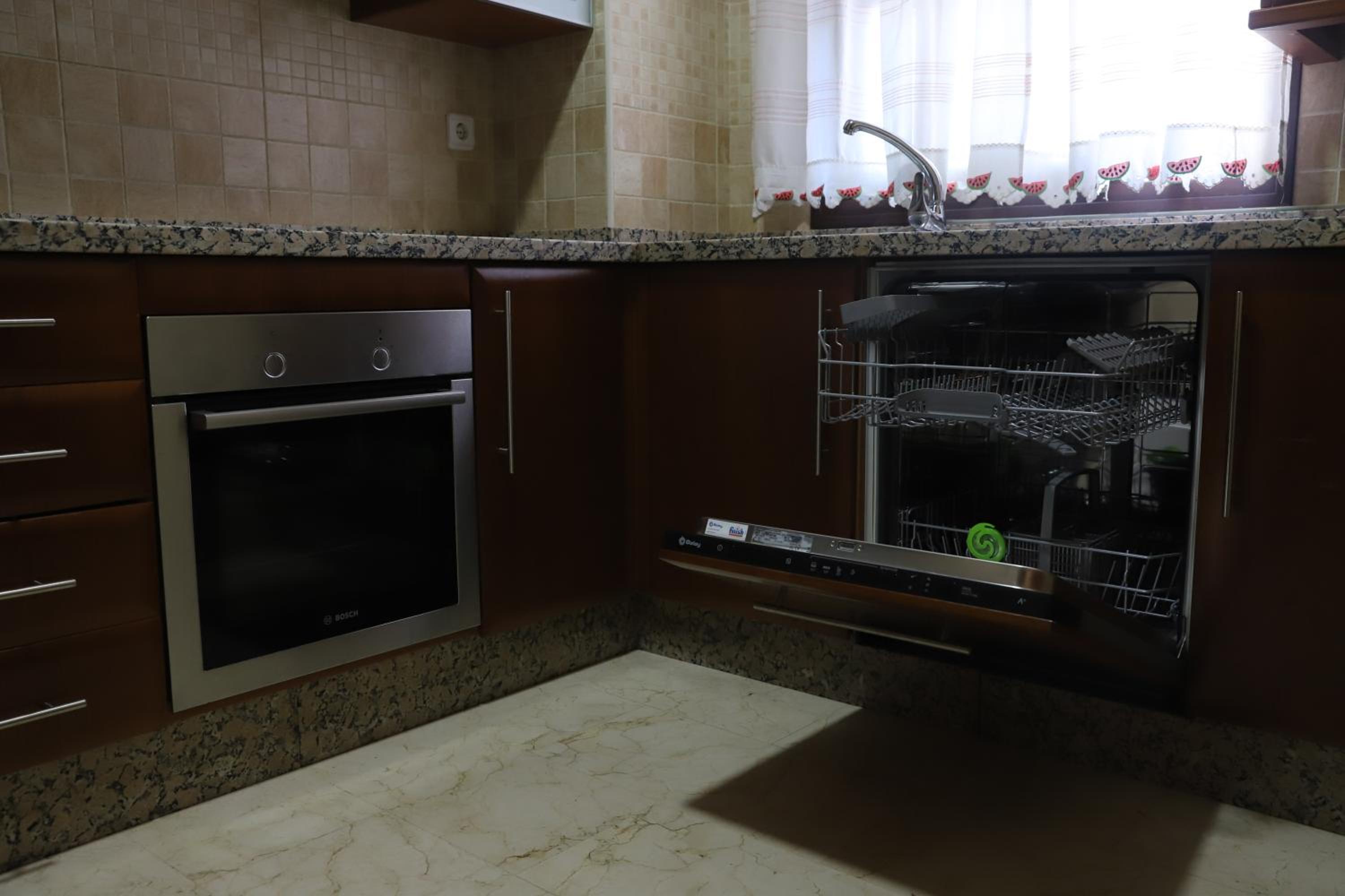 Three-Bedroom Apartment - Photo 36