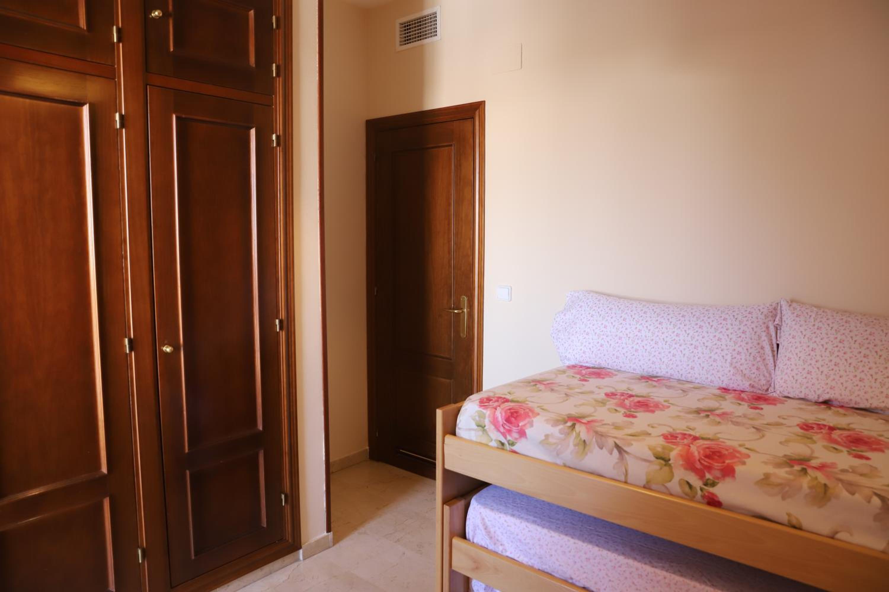 Three-Bedroom Apartment - Photo 30