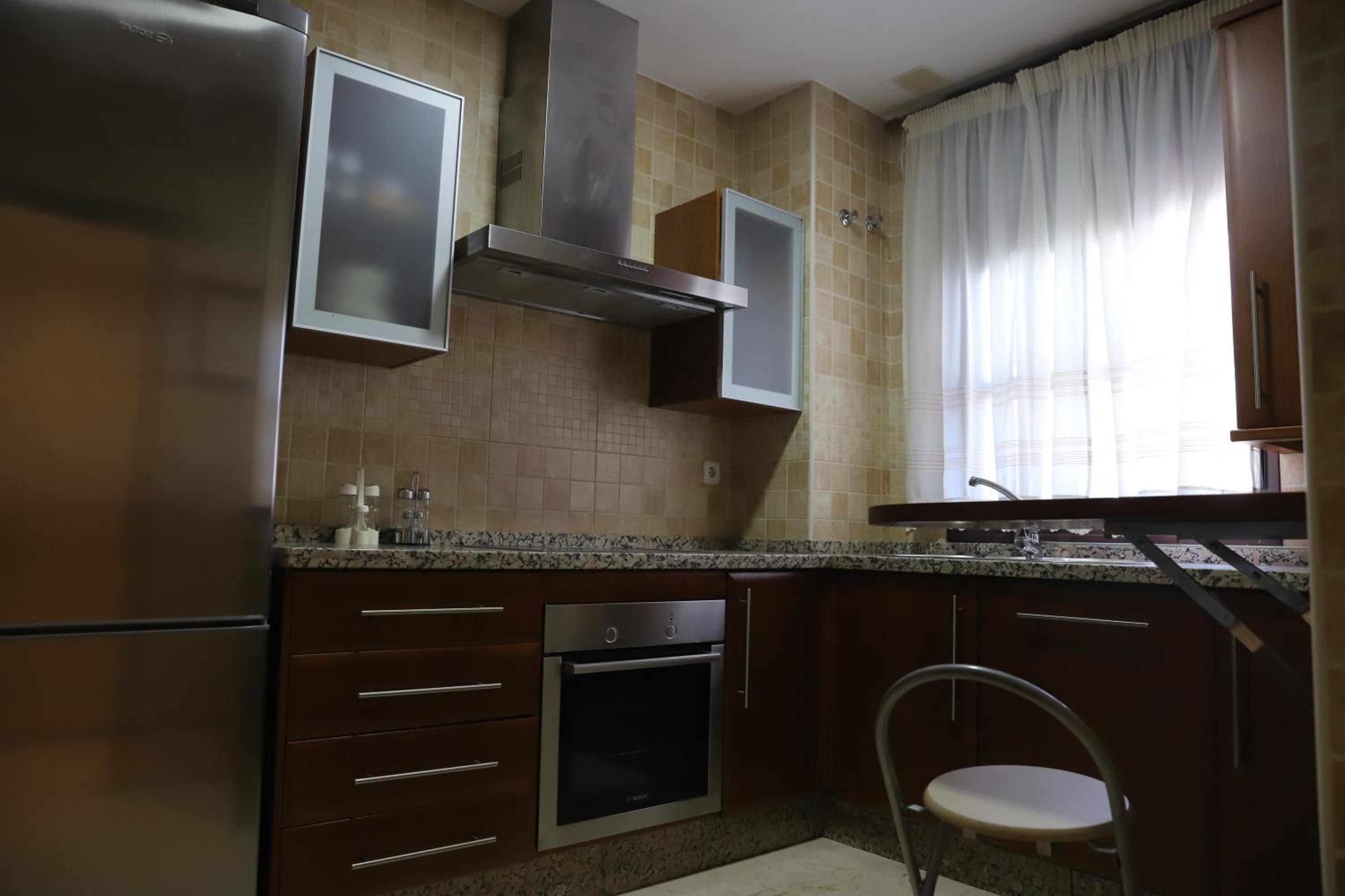 Three-Bedroom Apartment - Photo 23