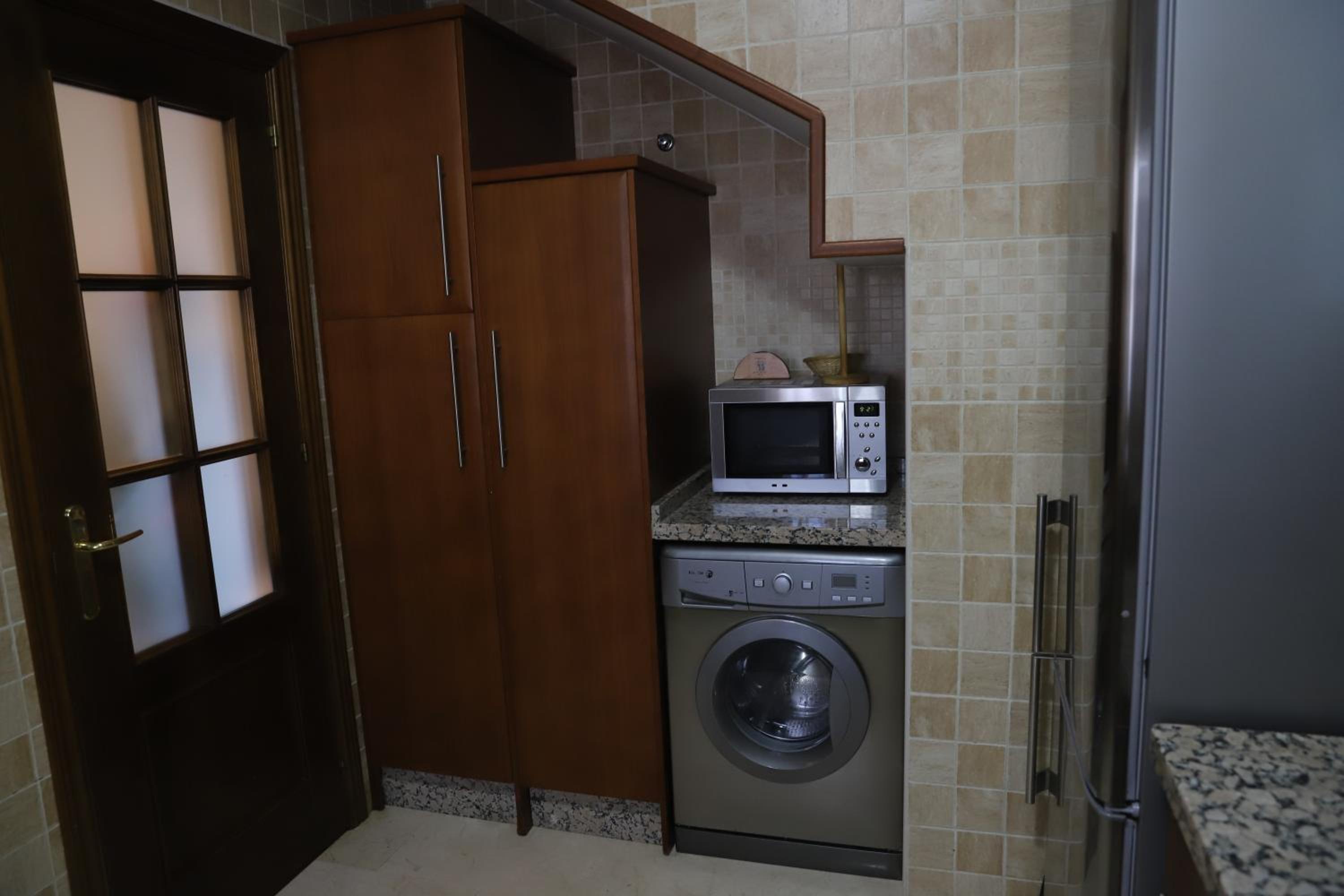 Three-Bedroom Apartment - Photo 19