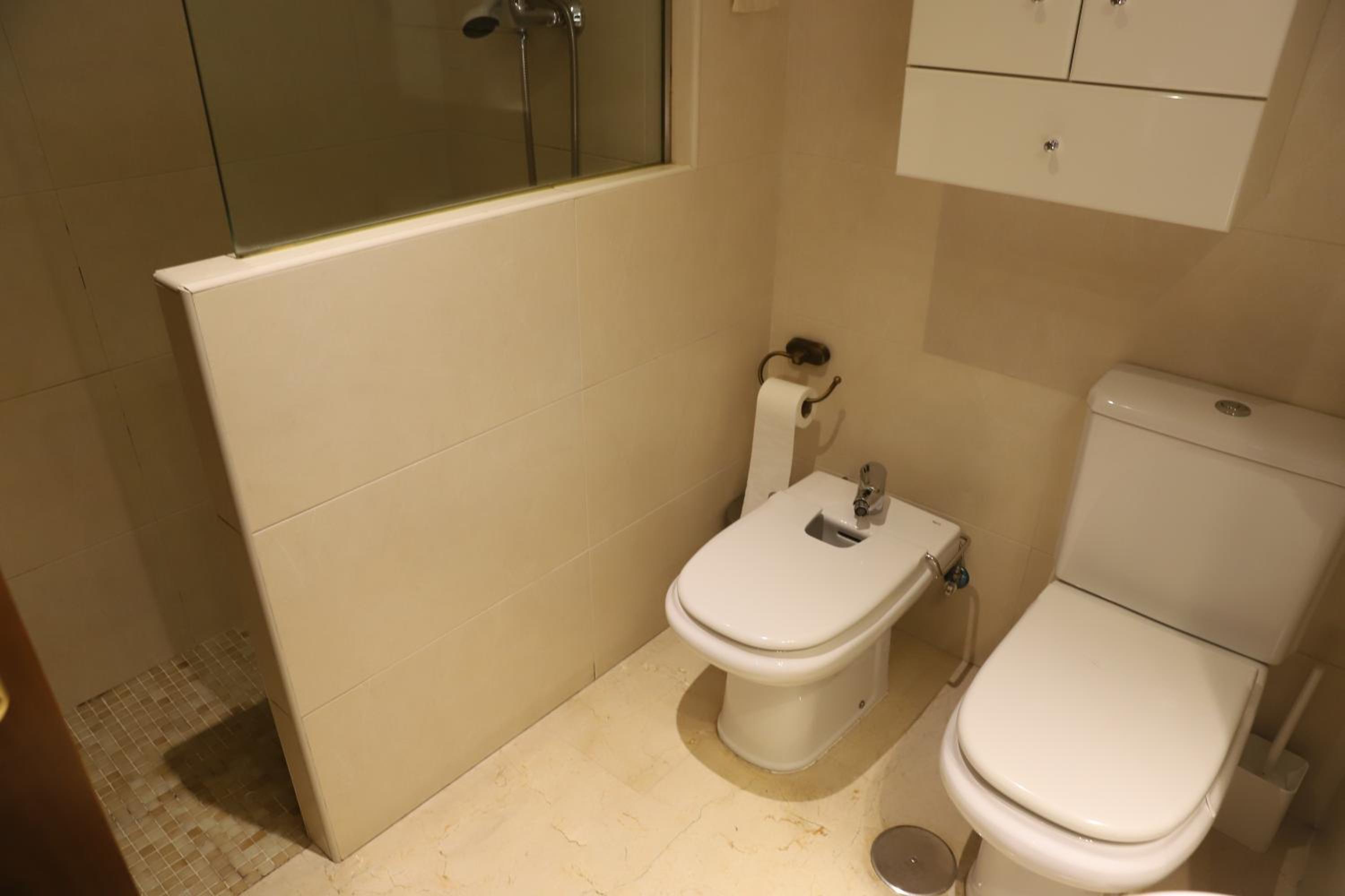 Three-Bedroom Apartment - Photo 12
