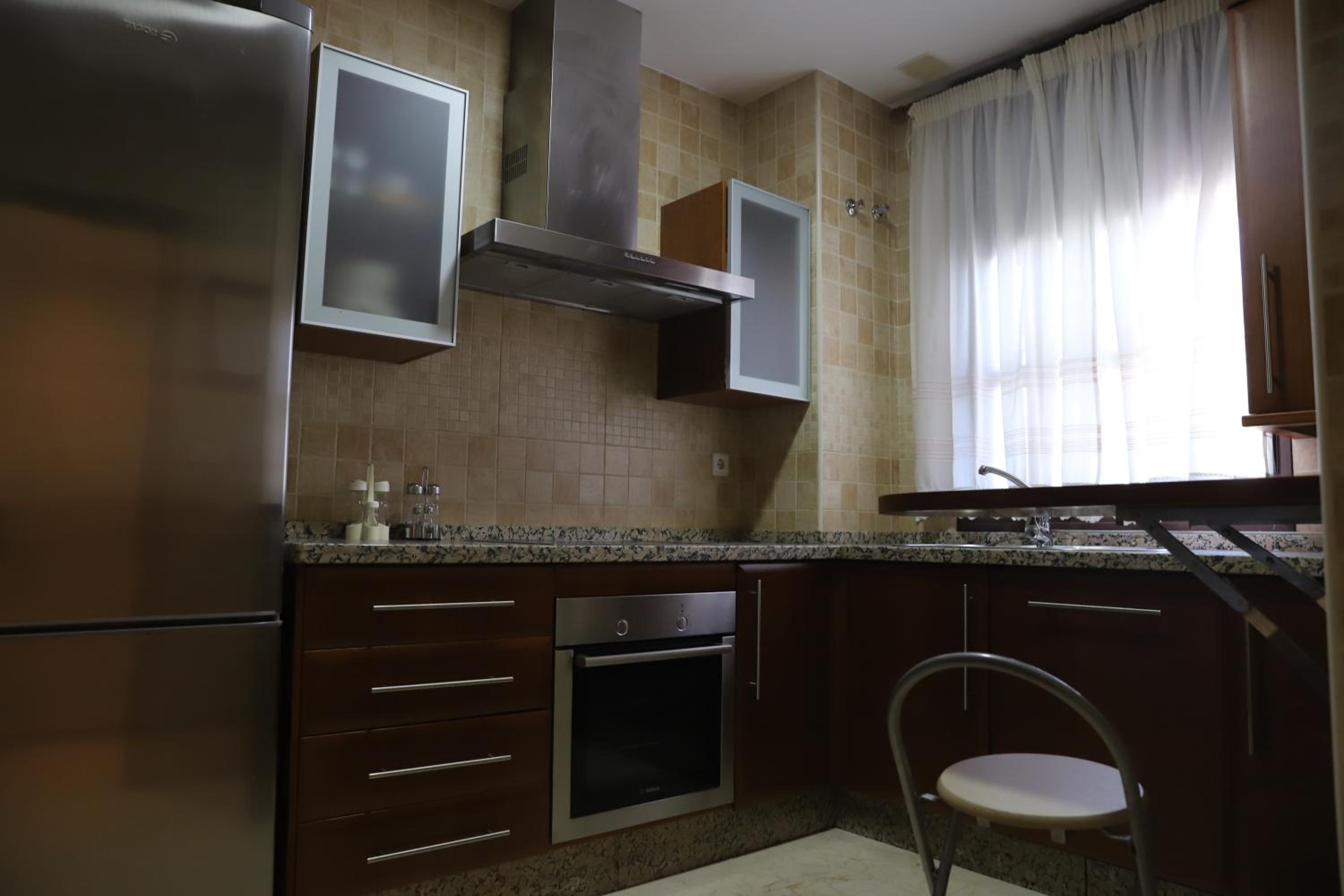 Three-Bedroom Apartment - Photo 9