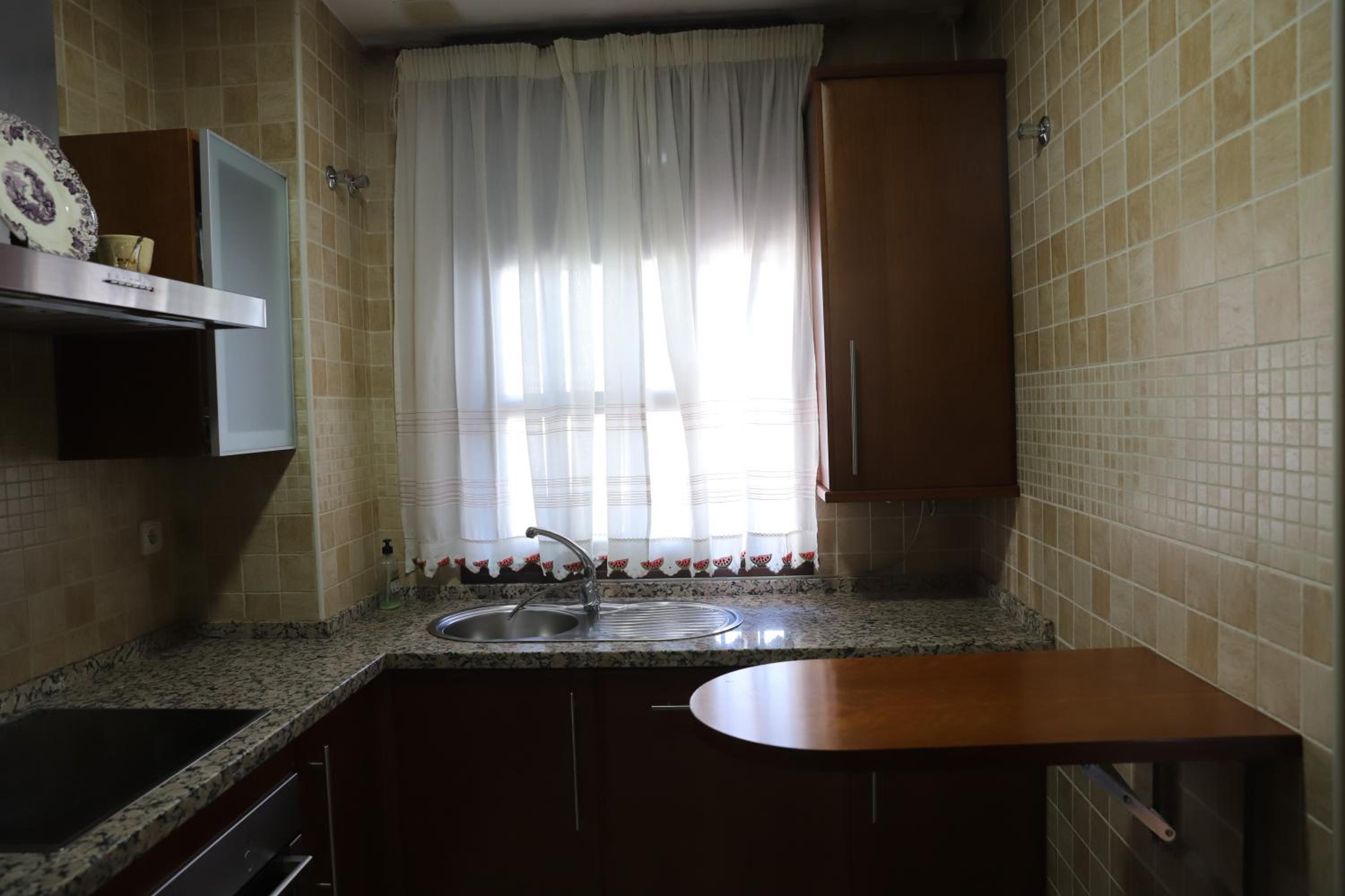 Three-Bedroom Apartment - Photo 6