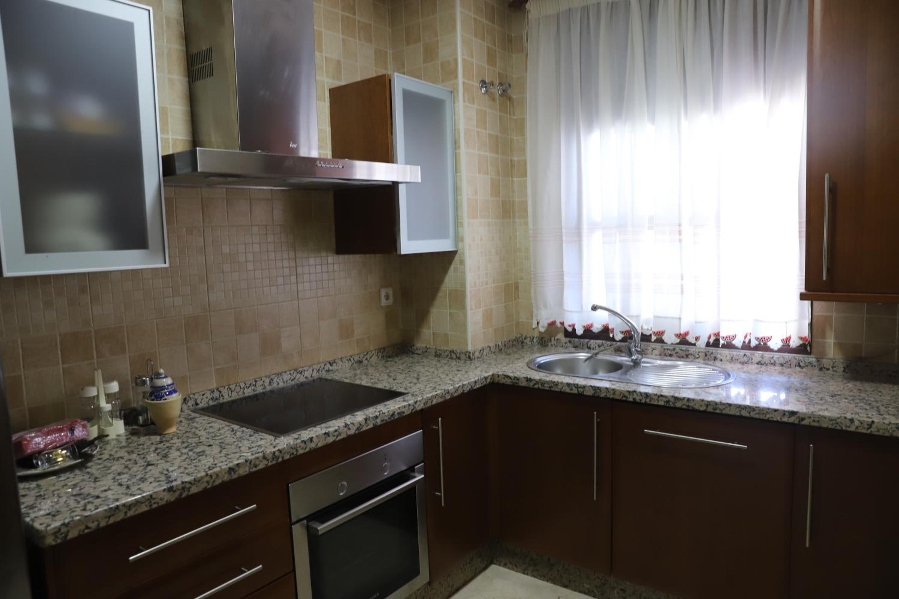 Three-Bedroom Apartment - Photo 48