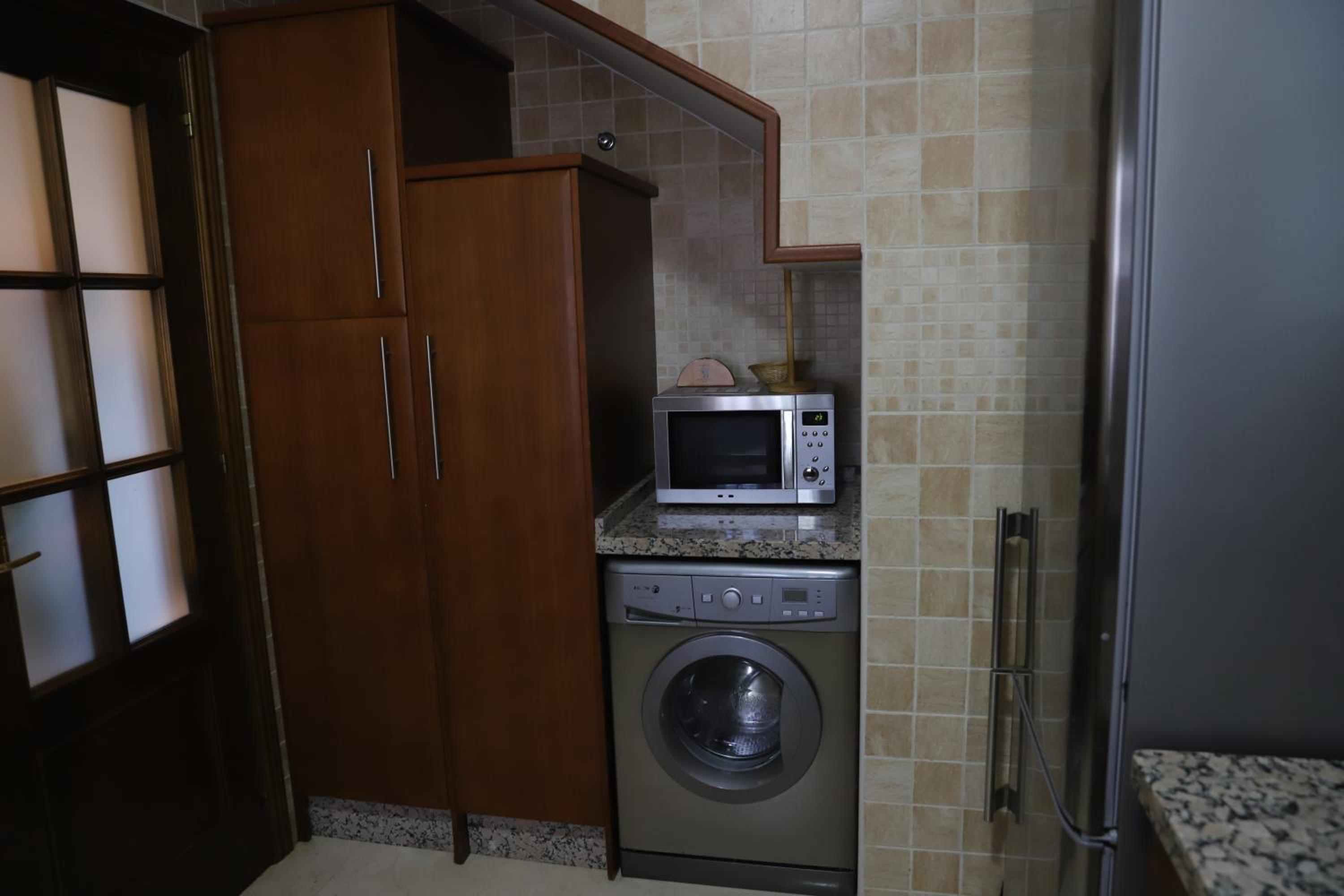 Three-Bedroom Apartment - Photo 2