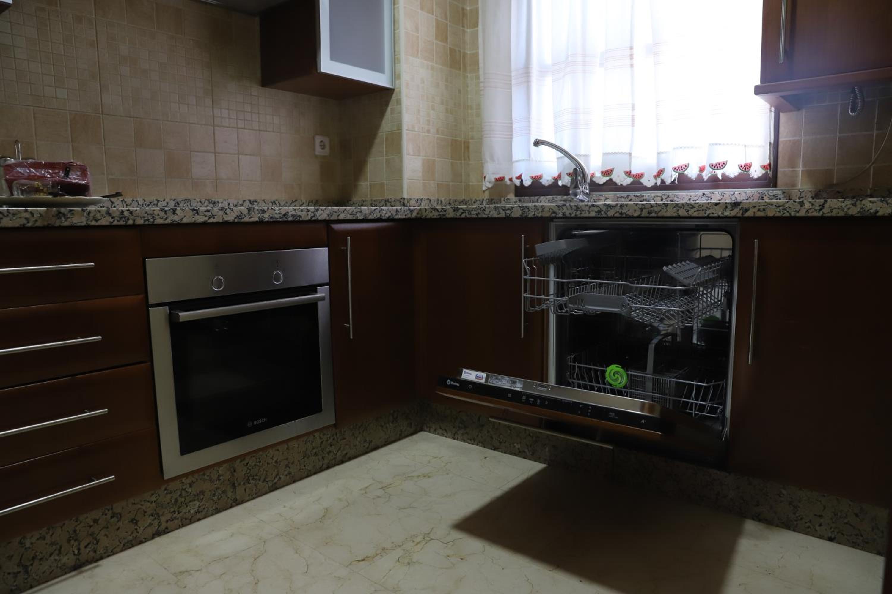 Three-Bedroom Apartment - Photo 68