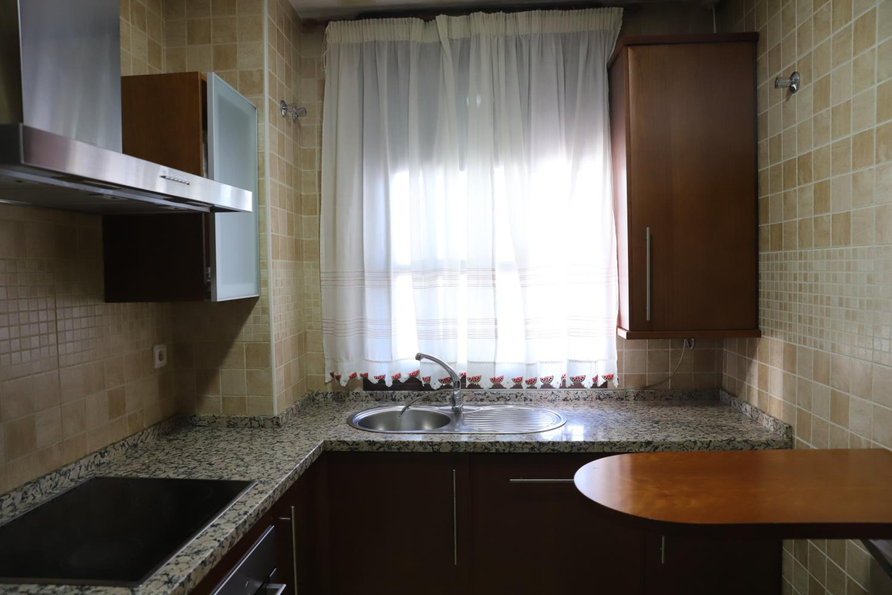 Three-Bedroom Apartment - Photo 63