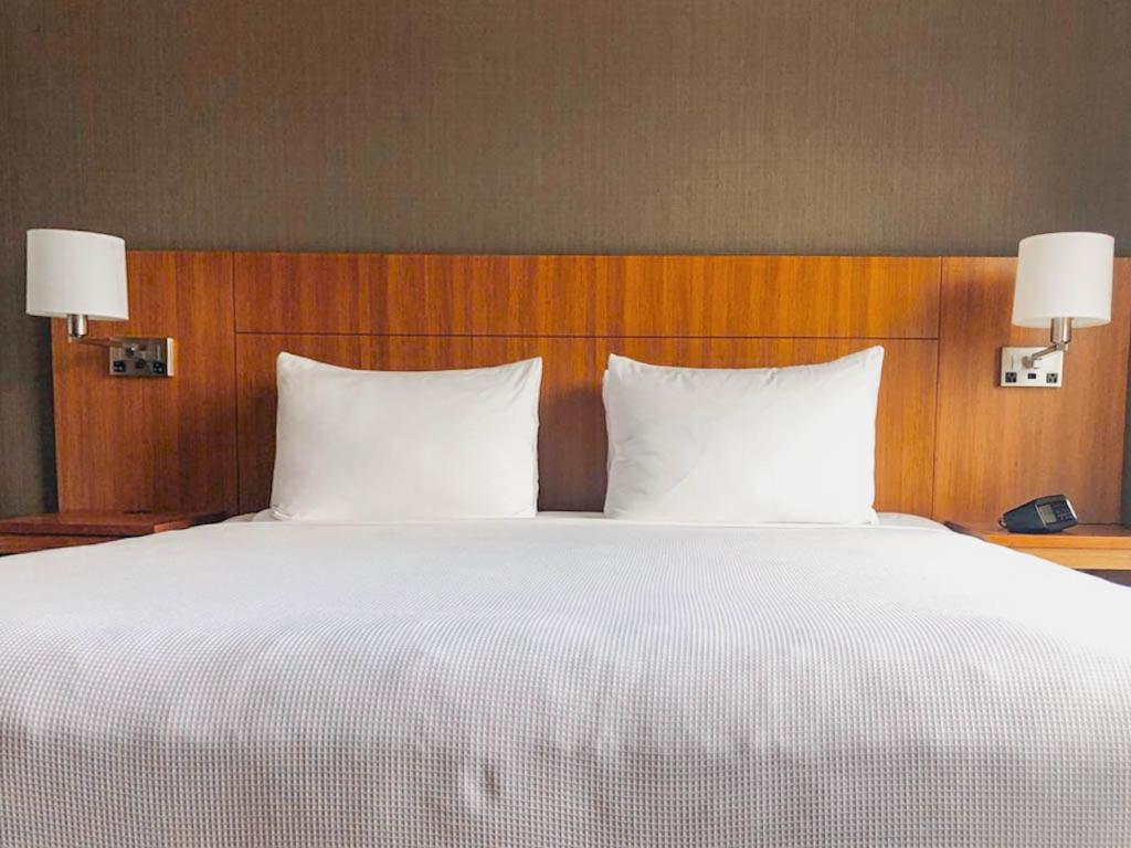 Standard Queen Room with Two Queen Beds and Sofa Bed photo 1