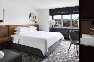 Deluxe Queen Room with Two Queen Beds and City View - Photo 1