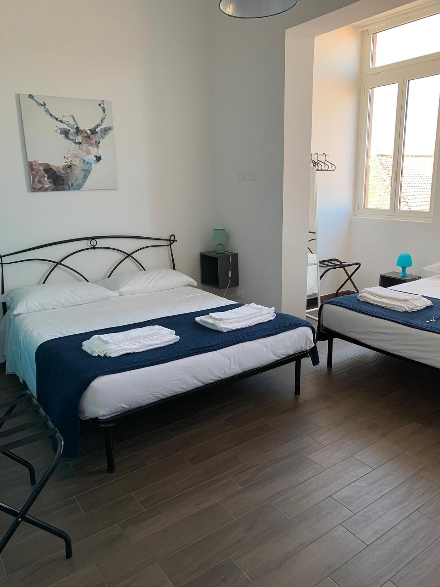 Quadruple Room with Private Bathroom - Photo 4