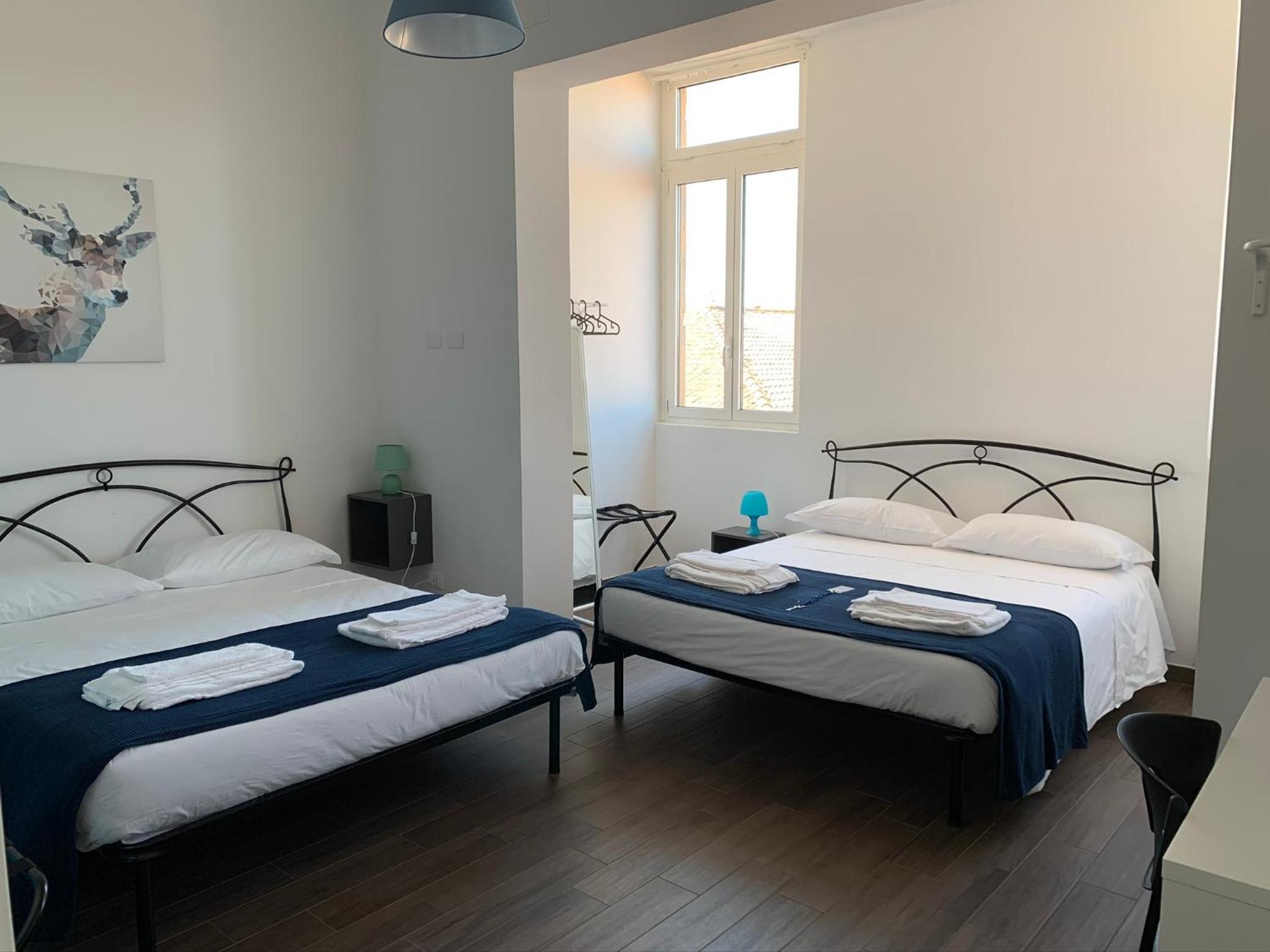 Quadruple Room with Private Bathroom - Photo 3