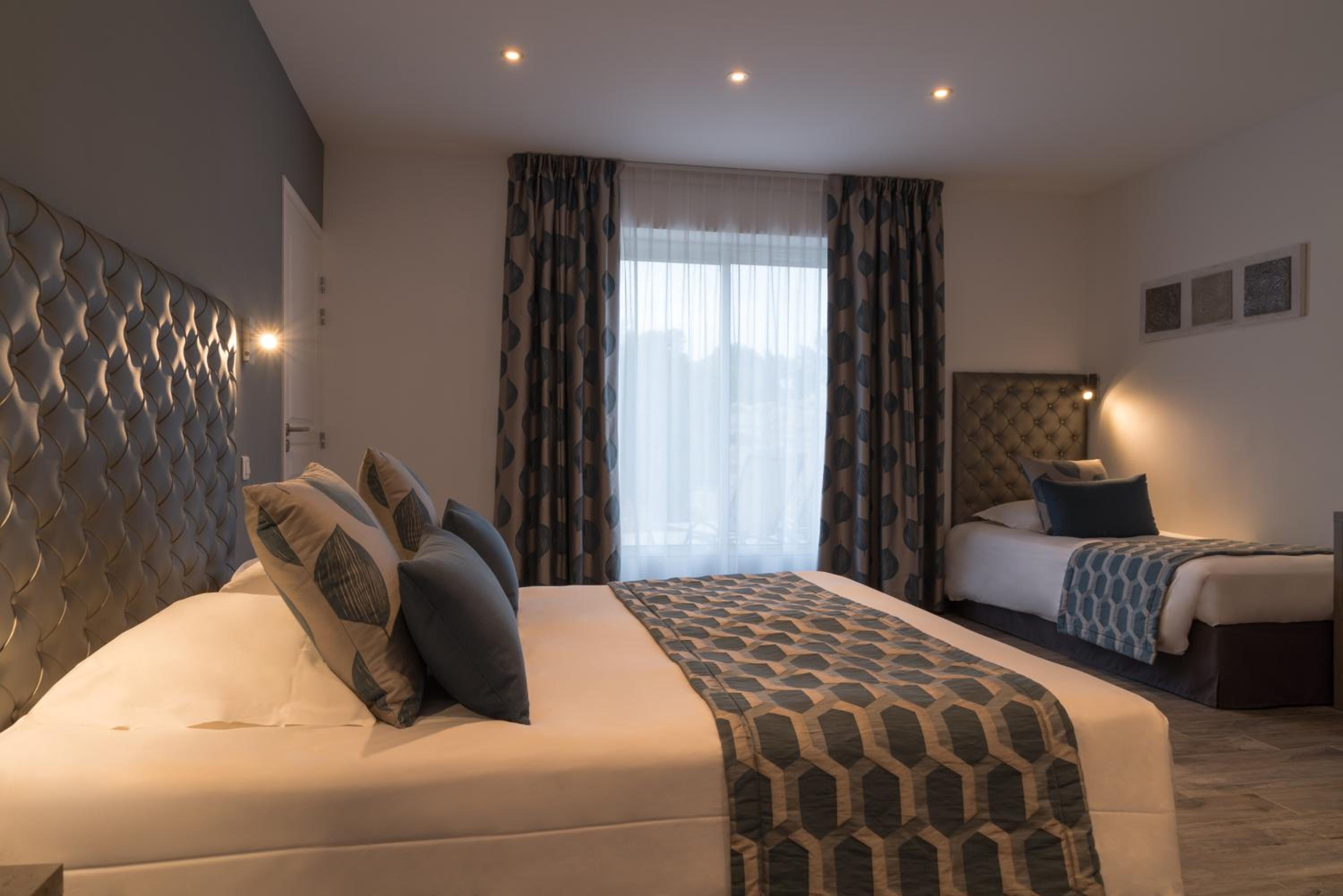 Deluxe Triple Room - Photo 1