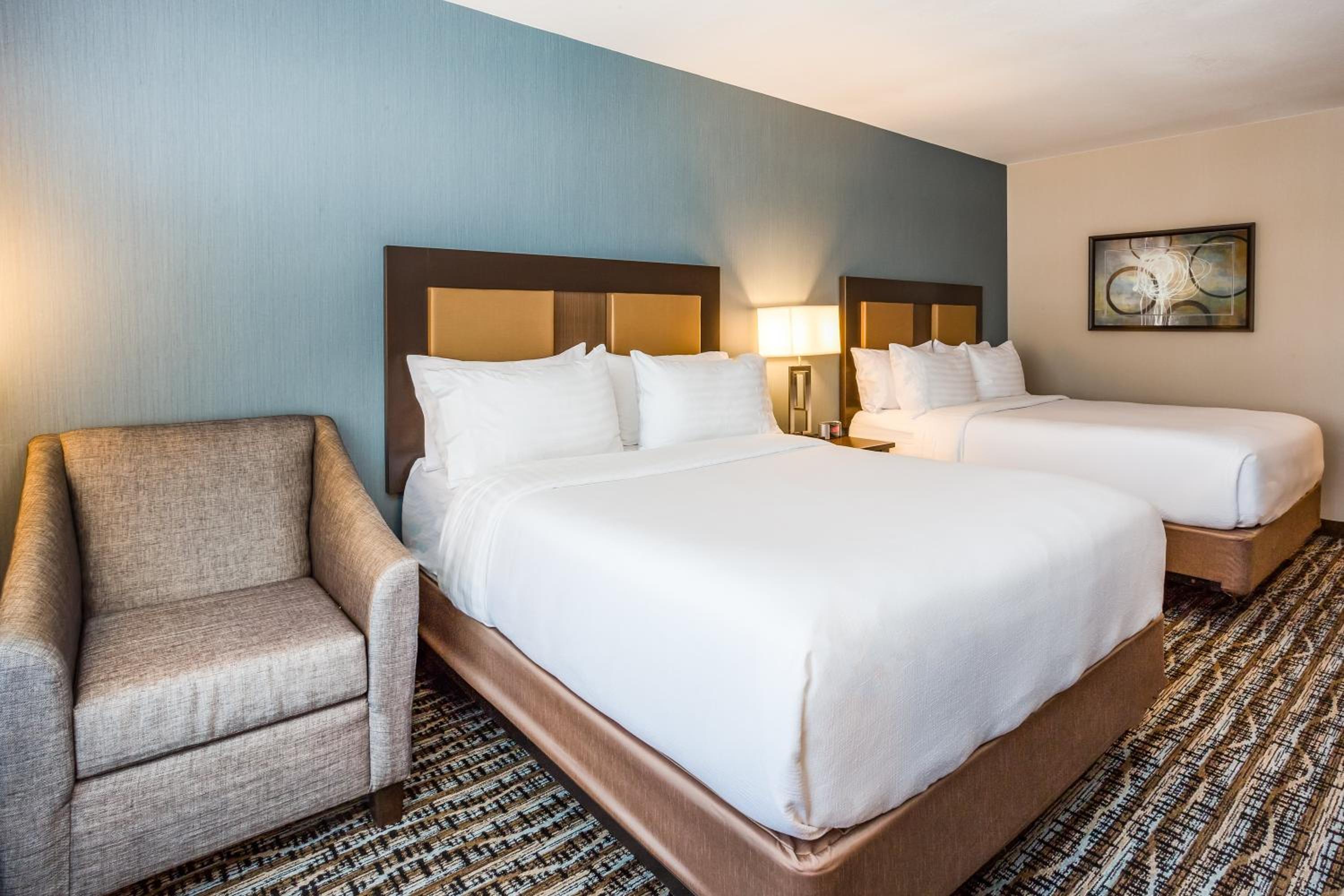 Standard Queen Room with Two Queen Beds and Mobility Accessible Roll-In Shower - Photo 1